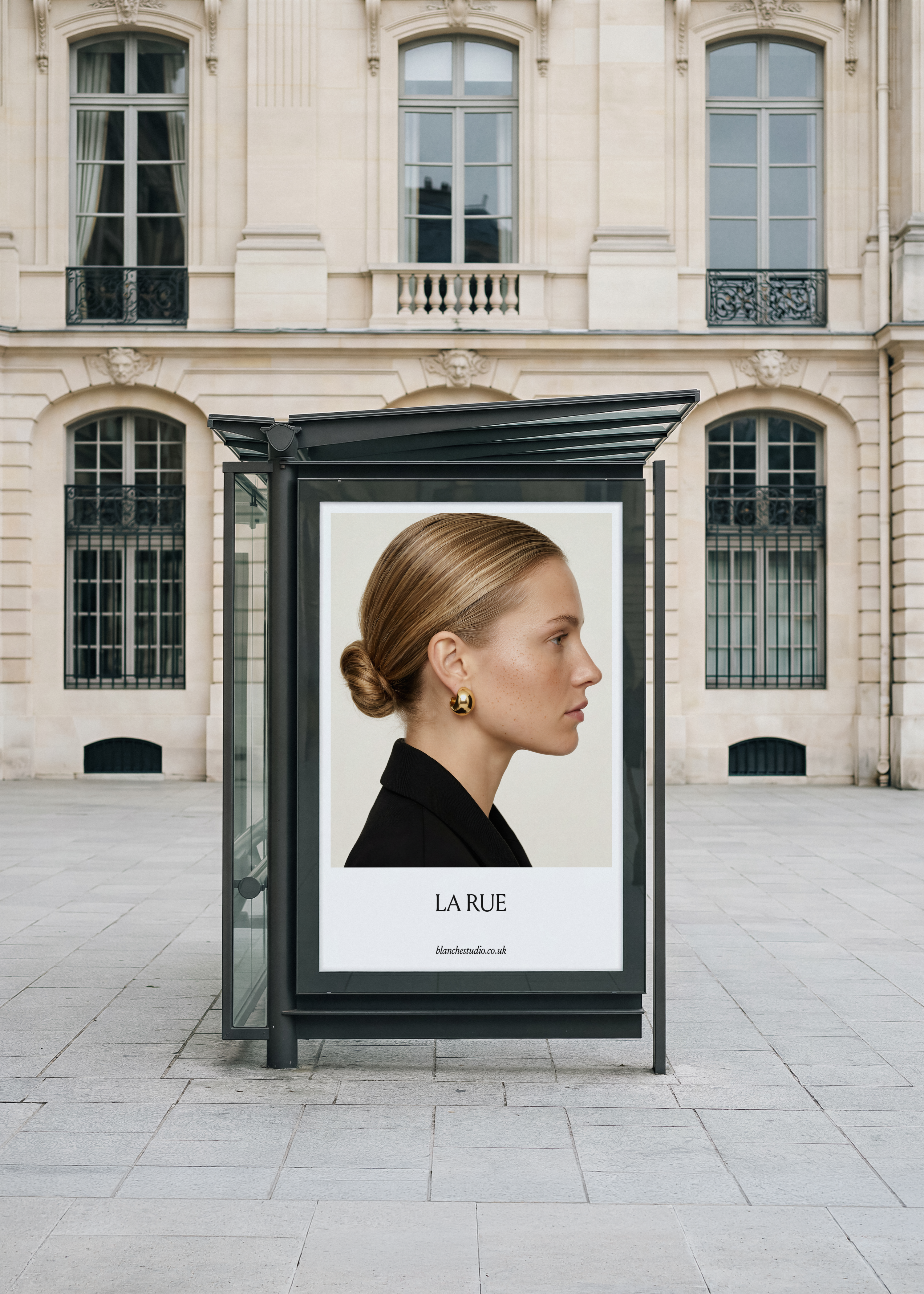 Bus shelter billboard mockup showing a blonde model profile in black with LA RUE text, set against a Paris facade