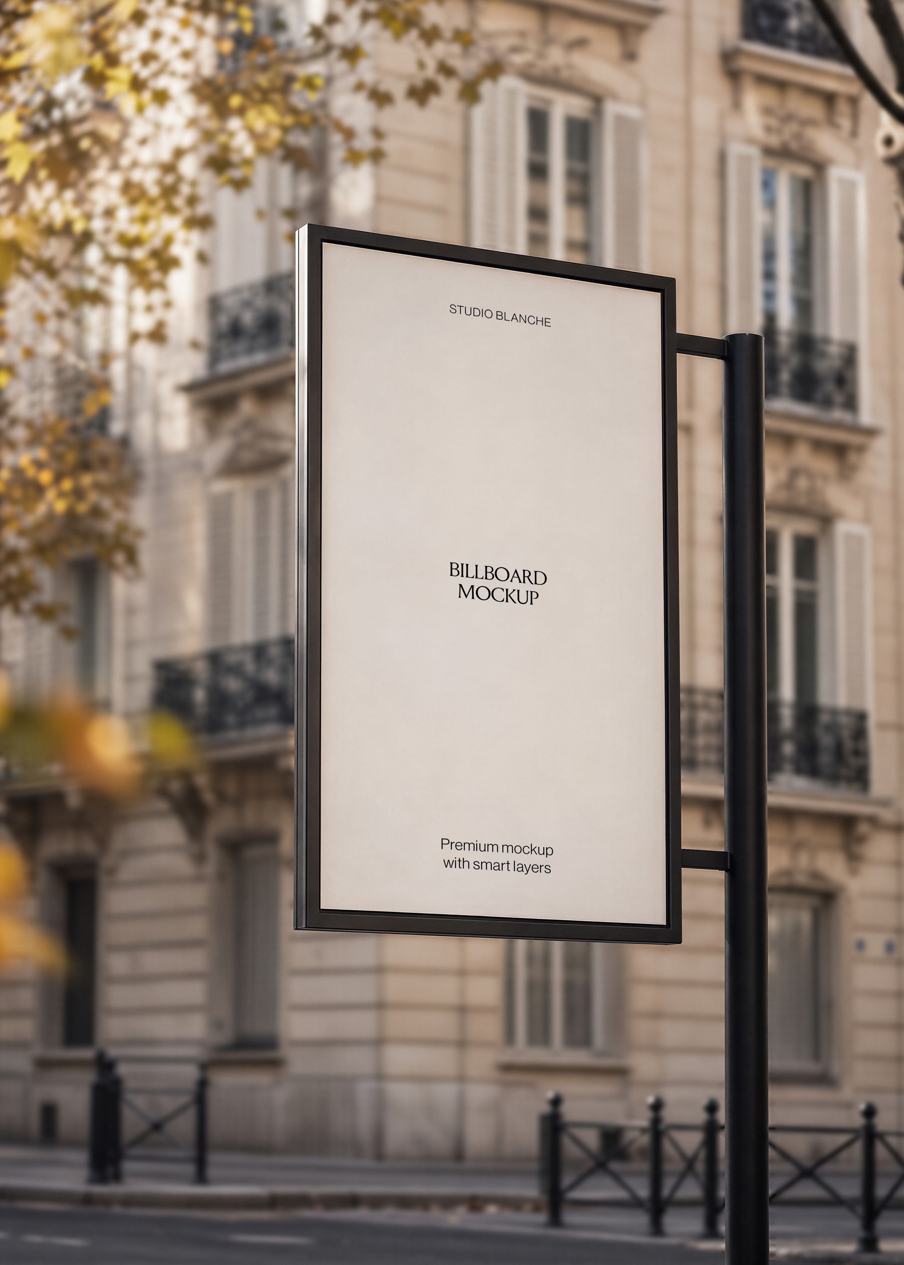 Blank hanging billboard mockup on black pole against blurred Parisian facade with autumn leaves and shutters