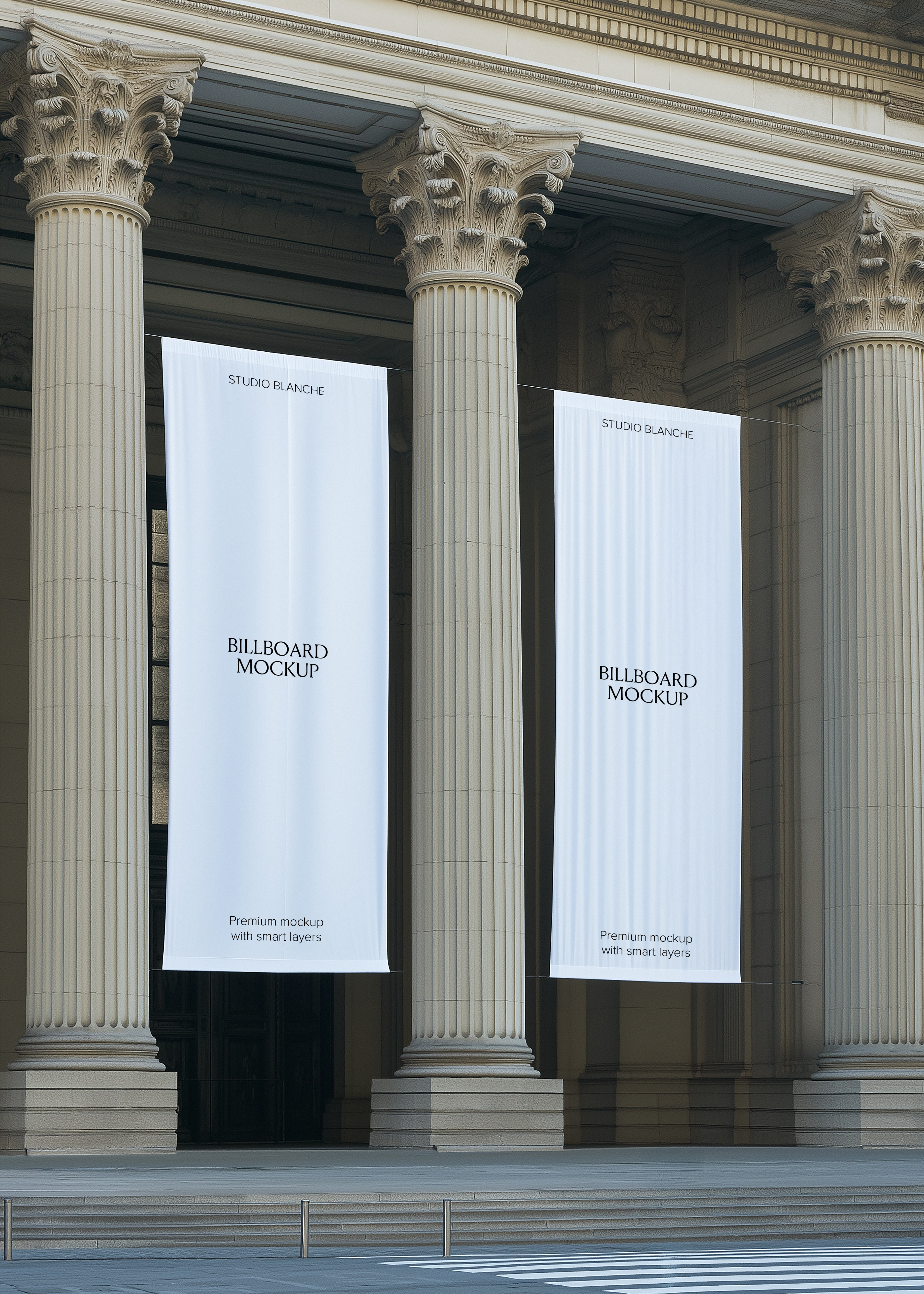 Two blank tapestry billboard mockups between Corinthian columns, empty white banners with Studio Blanche label