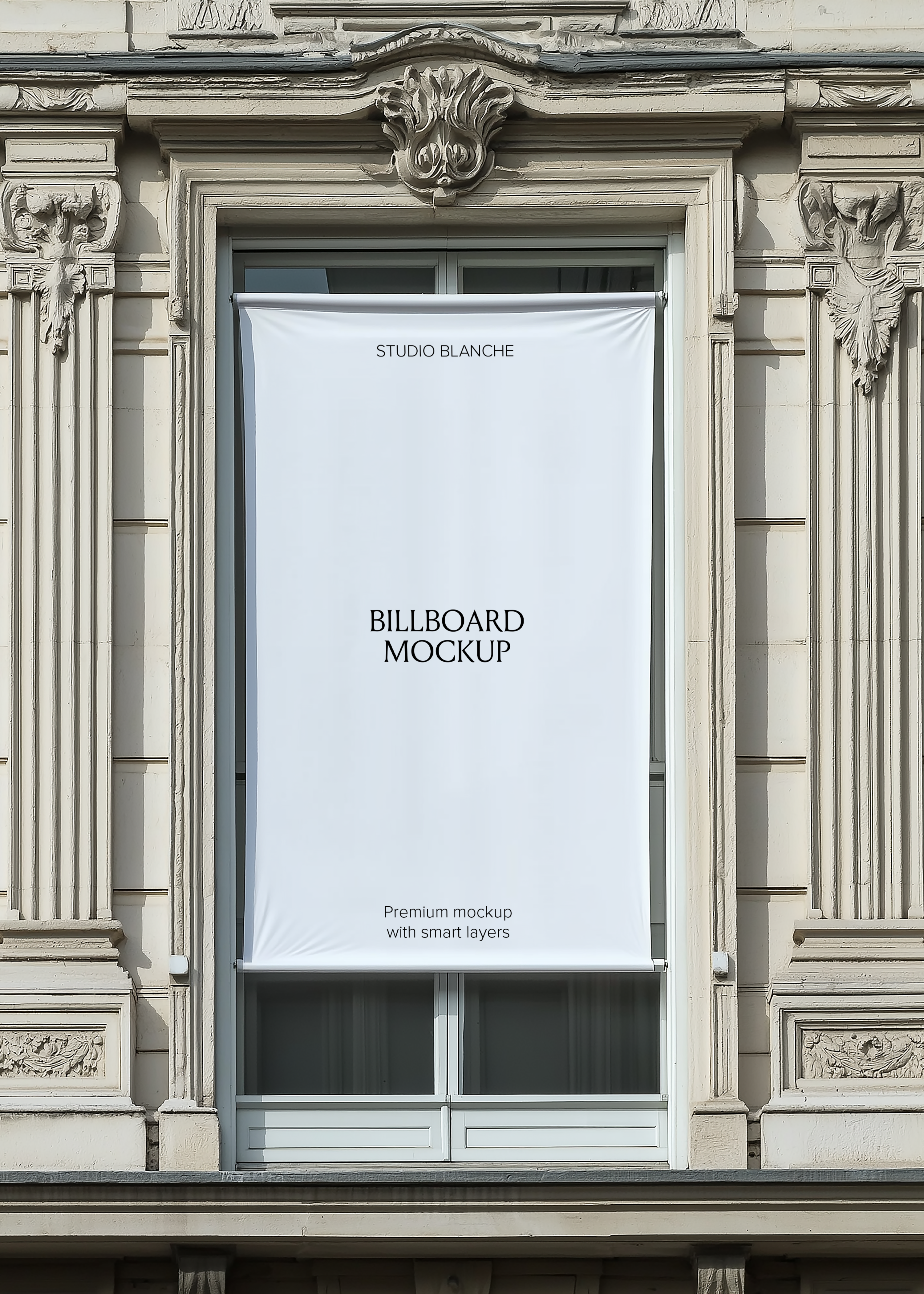 Blank window billboard mockup framed by carved Parisian stonework, empty white banner with Studio Blanche label