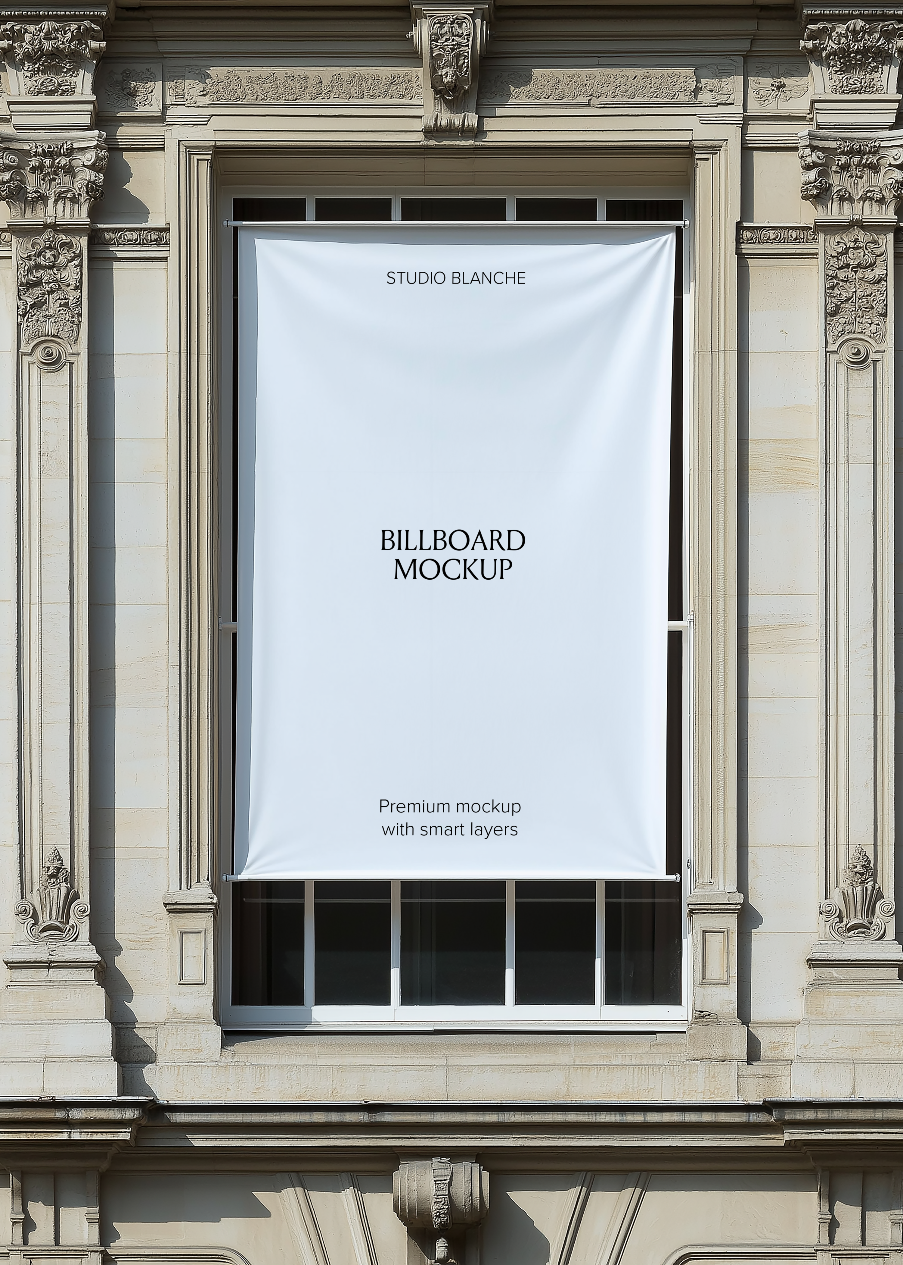 Blank window billboard mockup on a French stone facade, empty white banner with Studio Blanche label