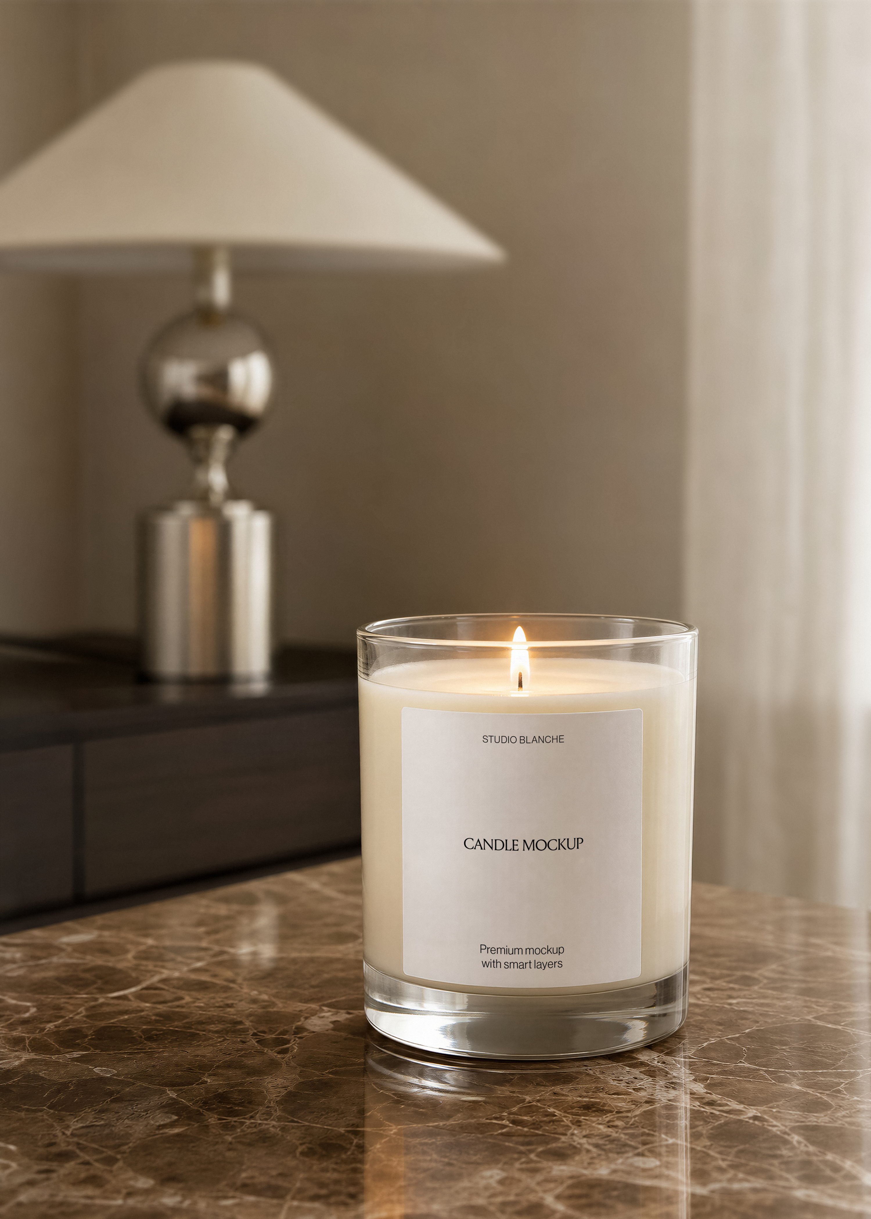 Glass candle jar mockup with minimal label and scent name, positioned off centre on a reflective marble tabletop