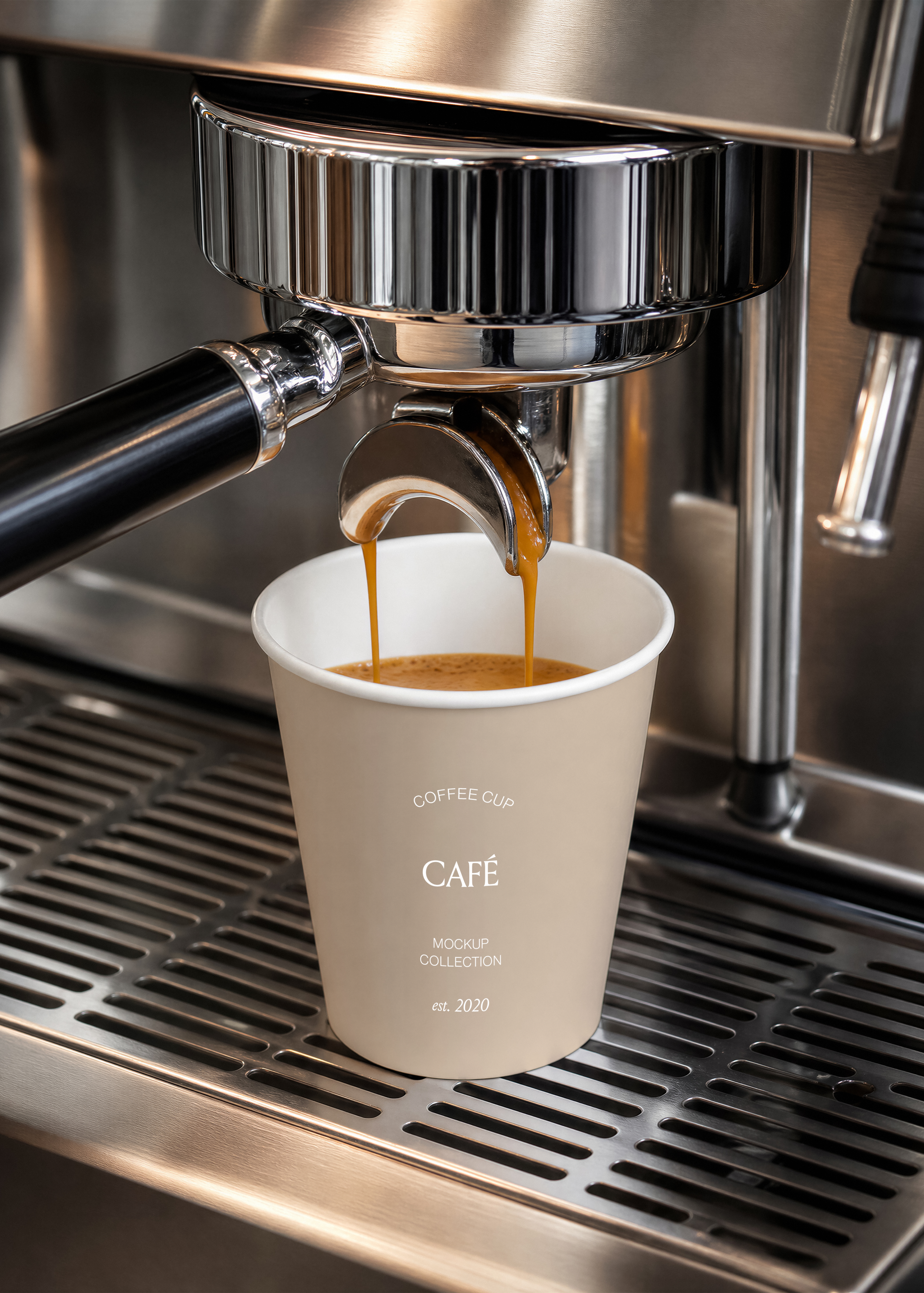 Coffee cup mockup under espresso machine group head, espresso pouring from double spout, brushed steel surface, close crop