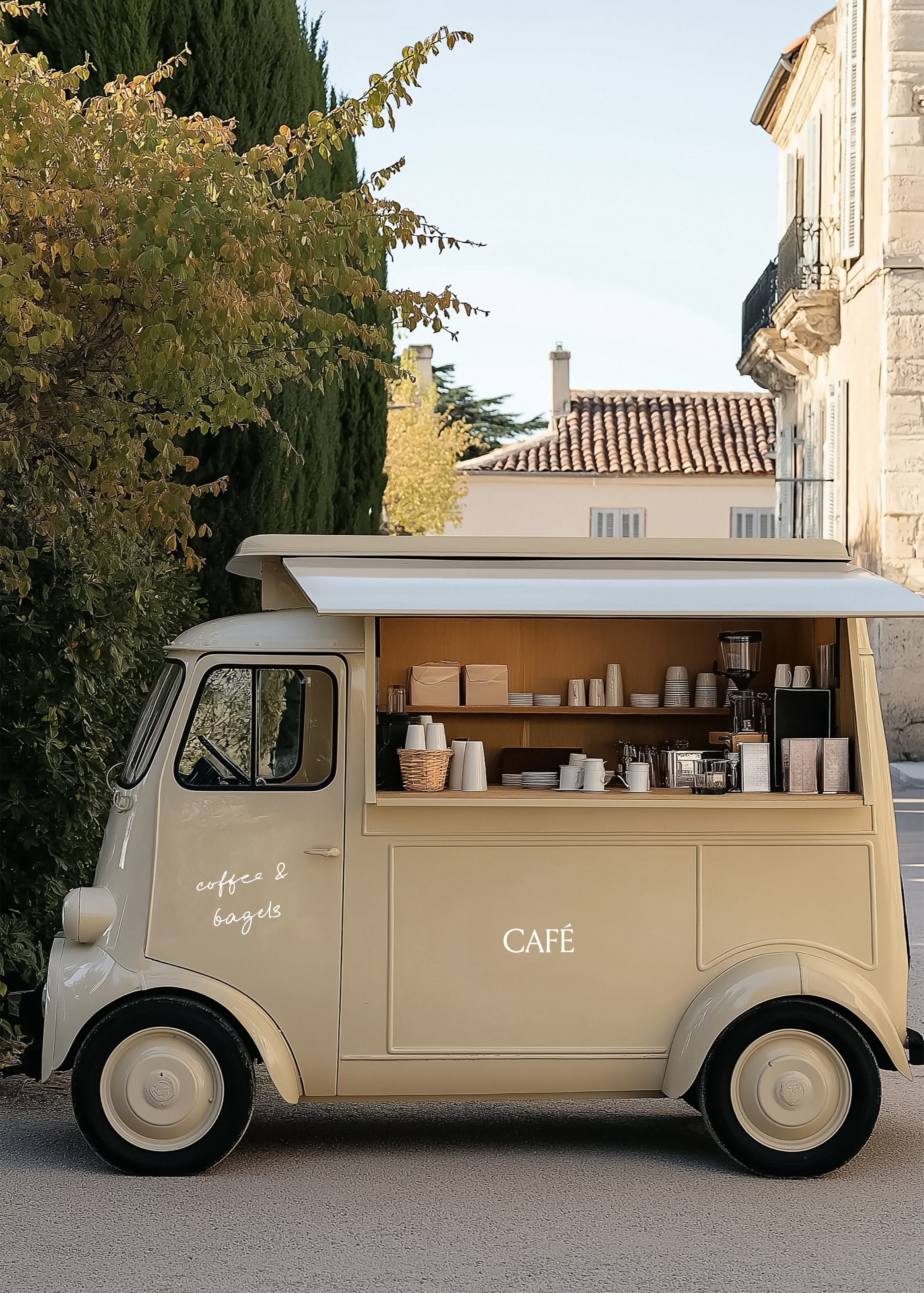Cream vintage coffee truck mockup parked on a village street with open serving hatch and stone buildings behind
