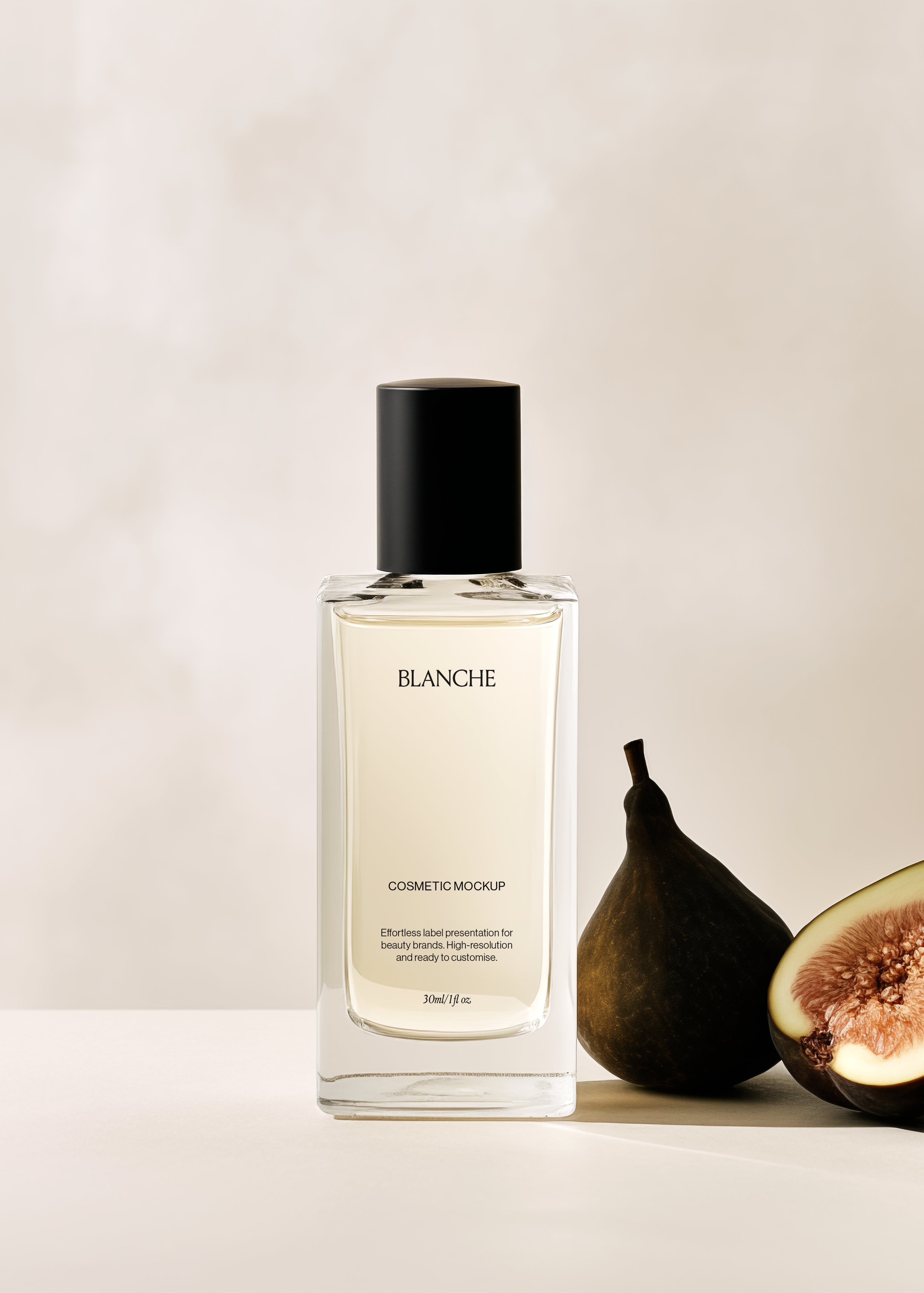 Clear glass cosmetic bottle mockup with tall black cap beside a whole fig and a halved fig, warm neutral scene