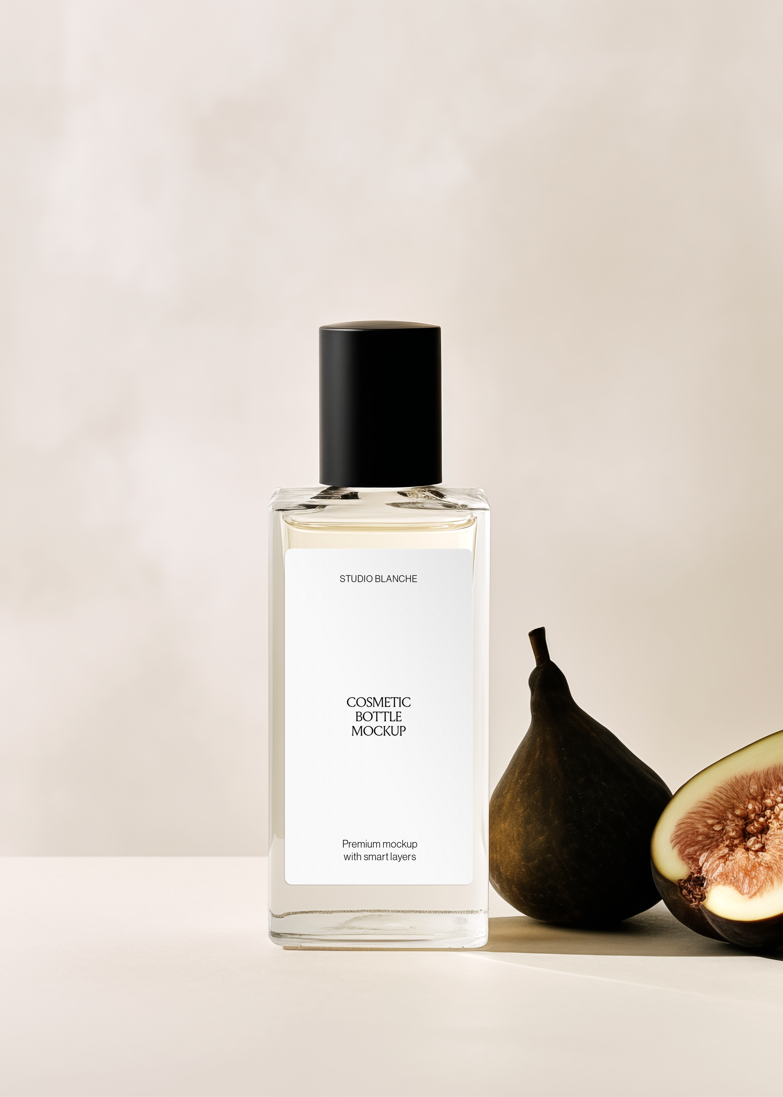Cosmetic bottle mockup with white label and tall black cap beside fresh figs, warm botanical still-life scene