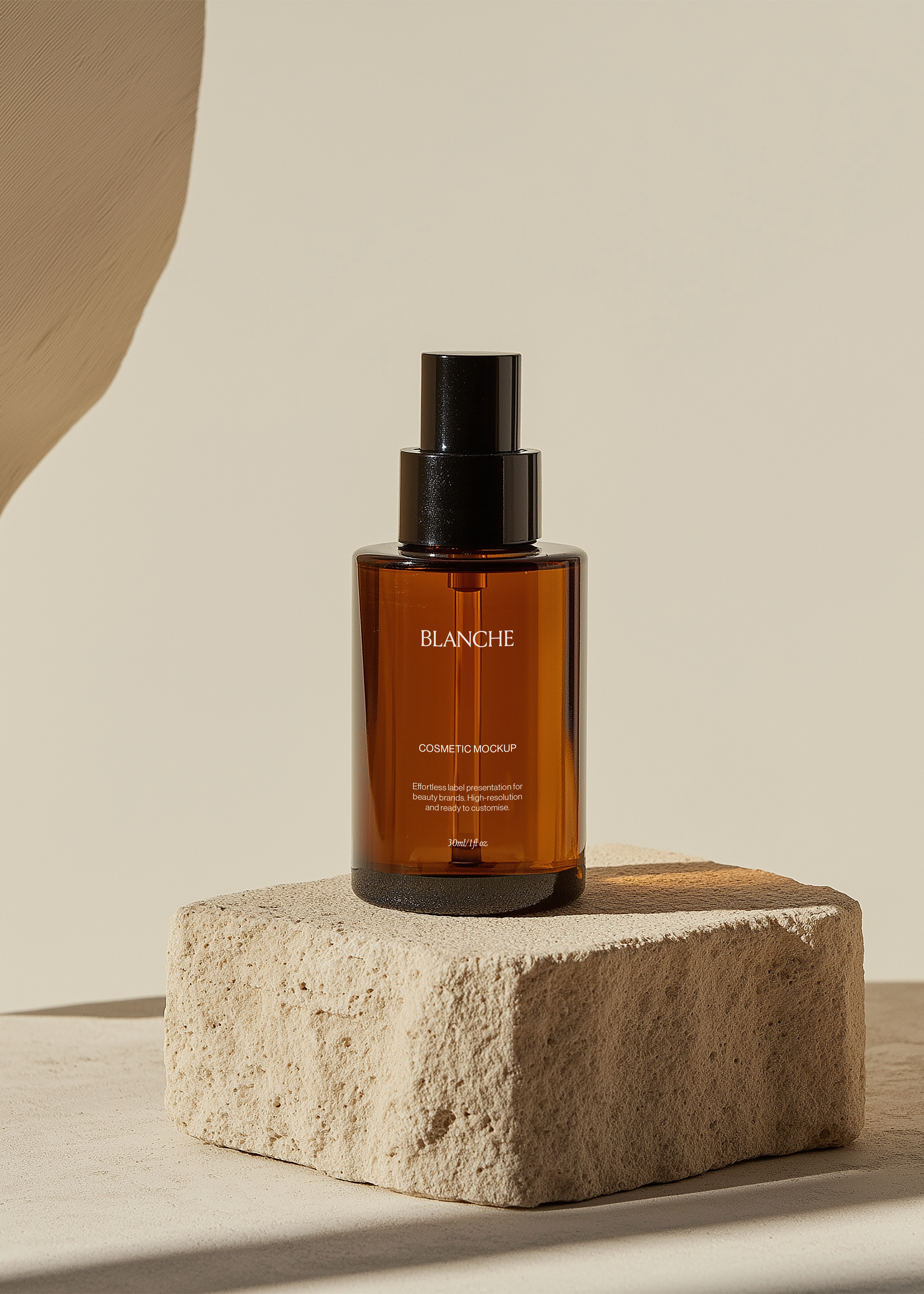 Amber glass cosmetic pump bottle mockup with black spray pump on a raw limestone block in warm sunlight