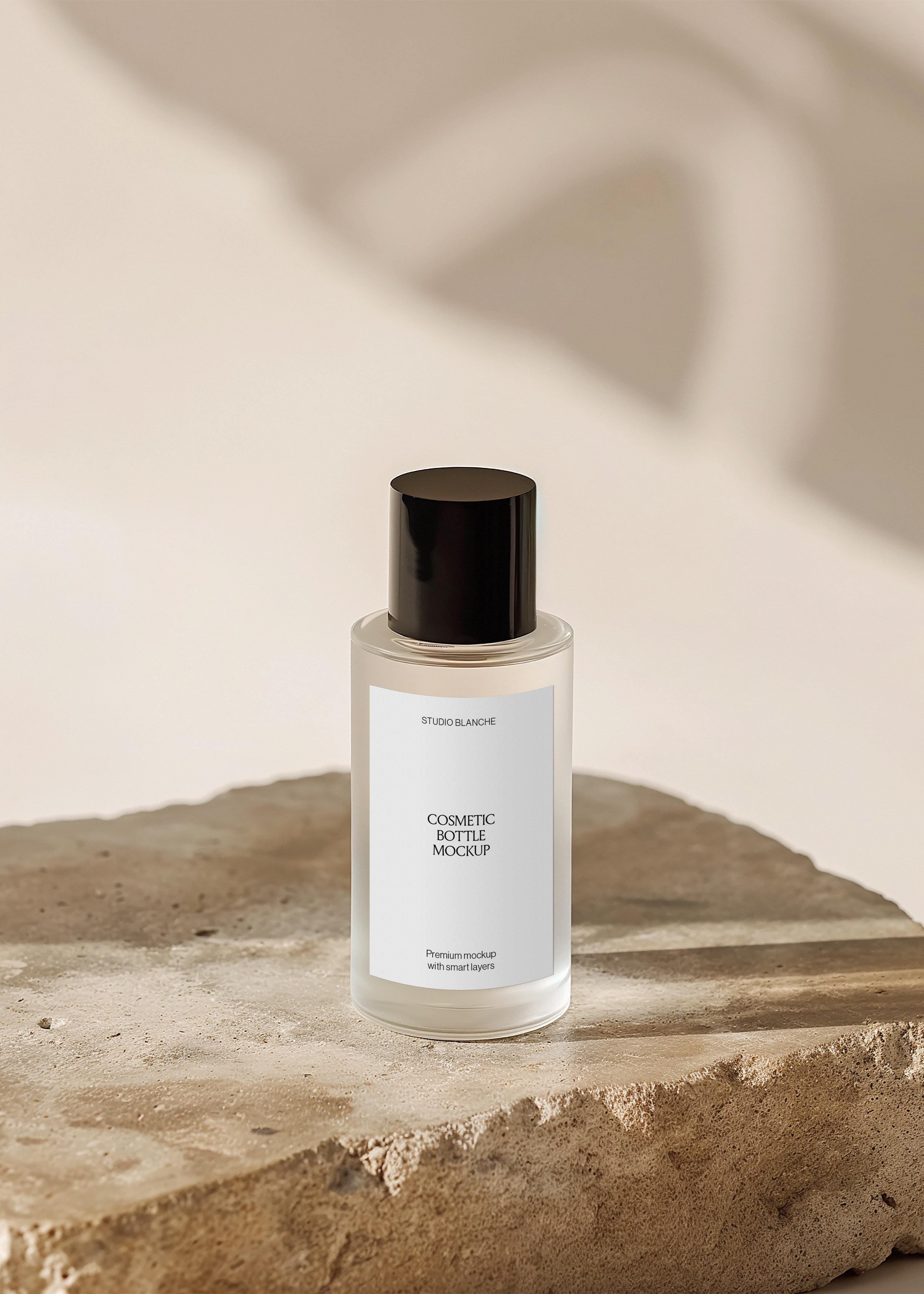 Frosted cosmetic bottle mockup with white label and tall black cap on raw travertine, warm minimal scene