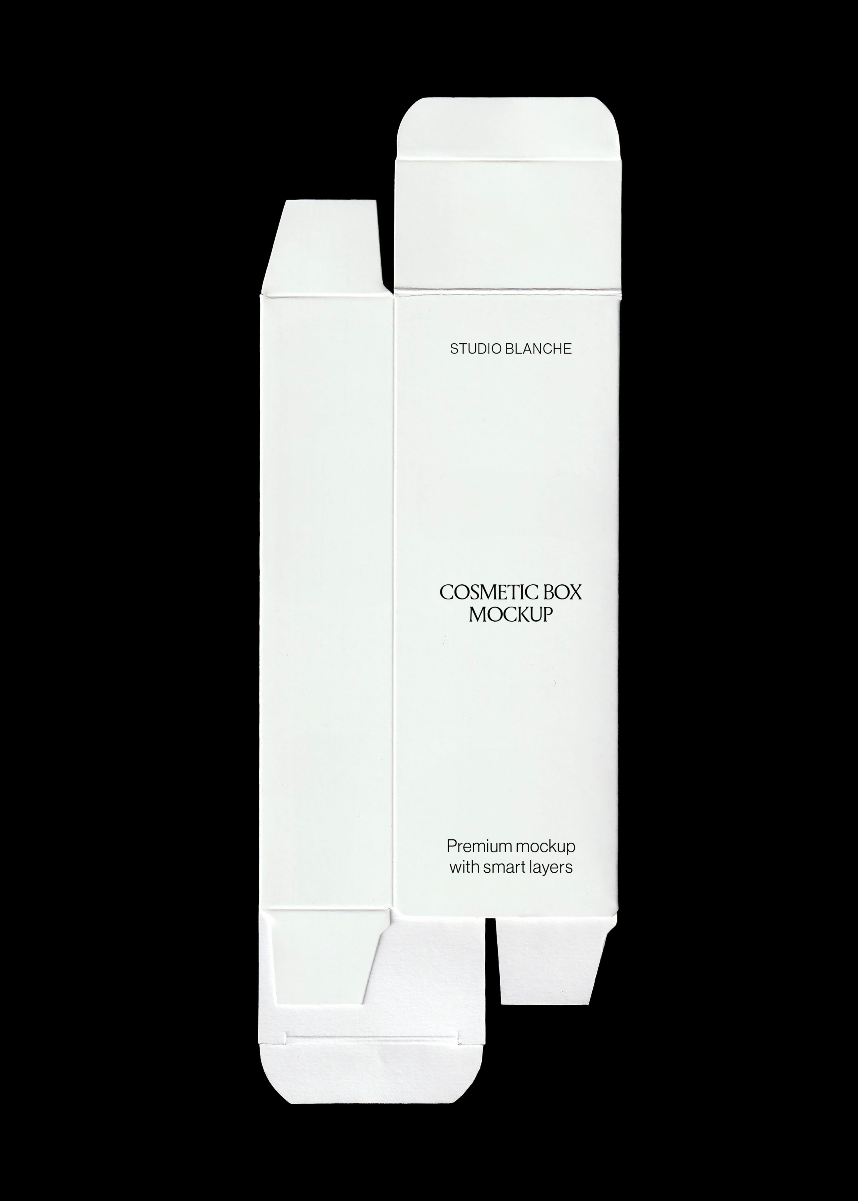 Blank white cosmetic box mockup laid flat with open end flaps and printed serif label text on black