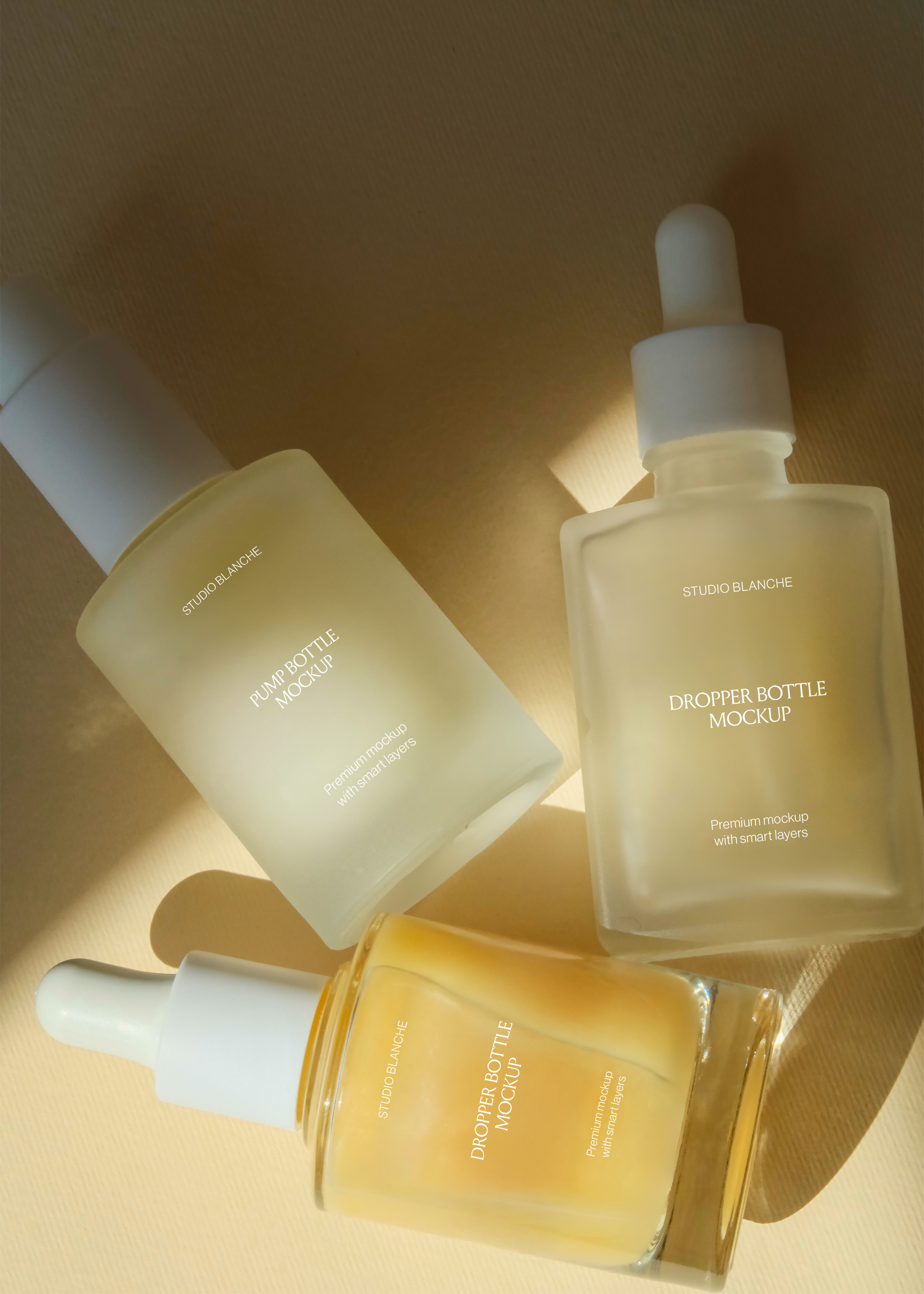 Skincare trio mockup with frosted pump bottle and amber dropper bottles, sunlit scattered composition on tan ground