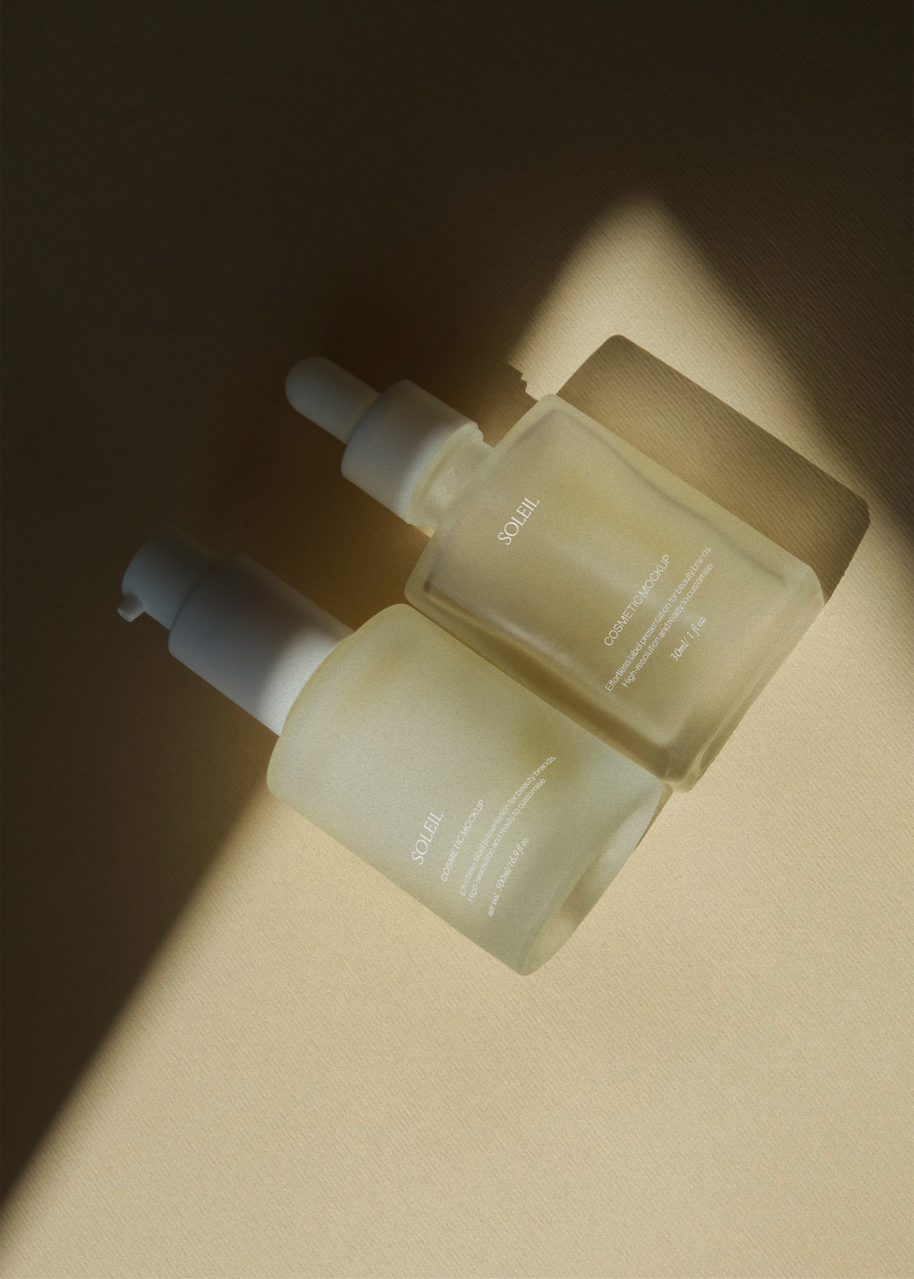 Frosted pump bottle and dropper bottle angled together on beige surface, hard sunlight and deep diagonal shadow