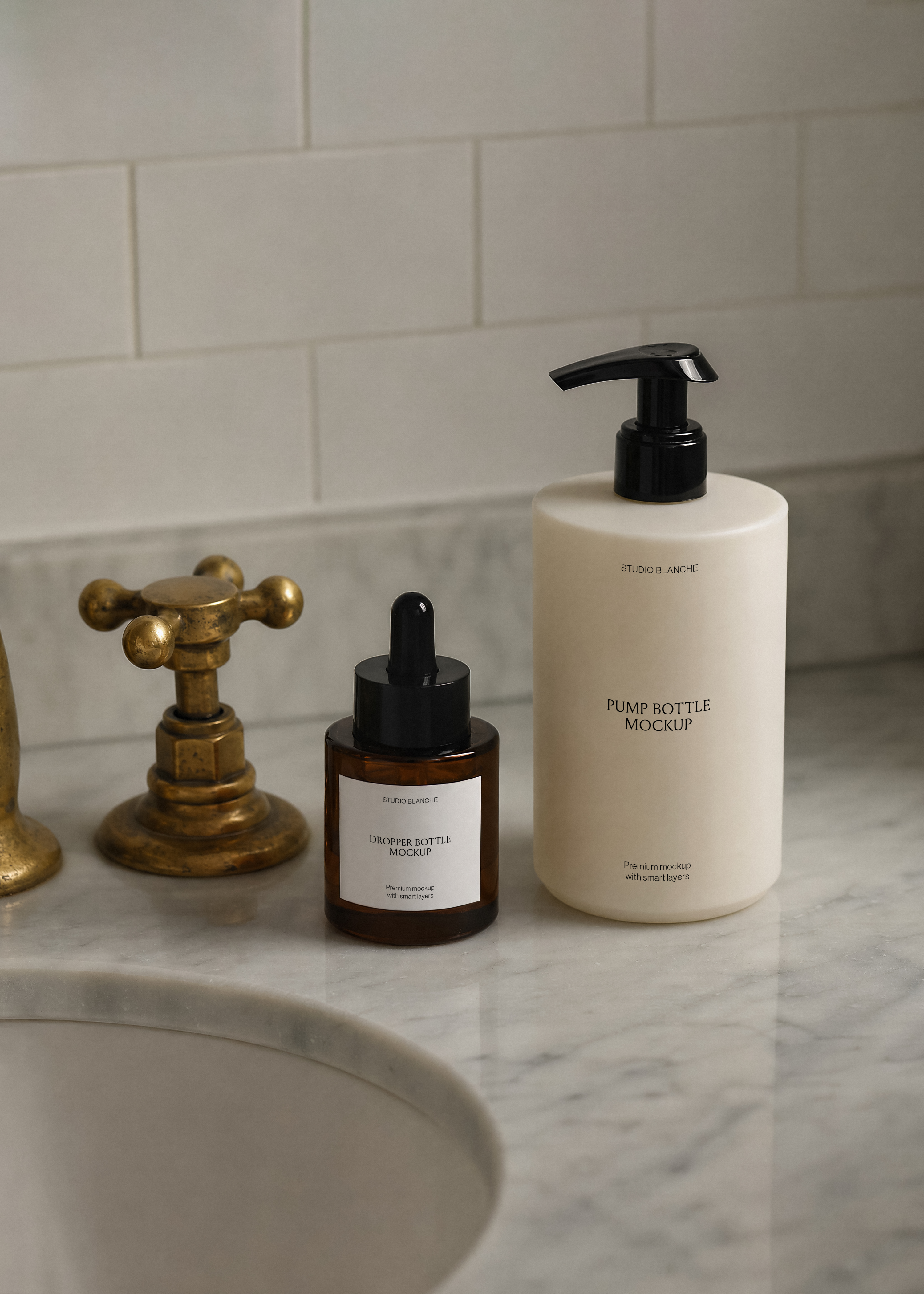Skincare dropper and pump bottle mockup set on white marble counter with brass cross-handle tap, soft daylight styling