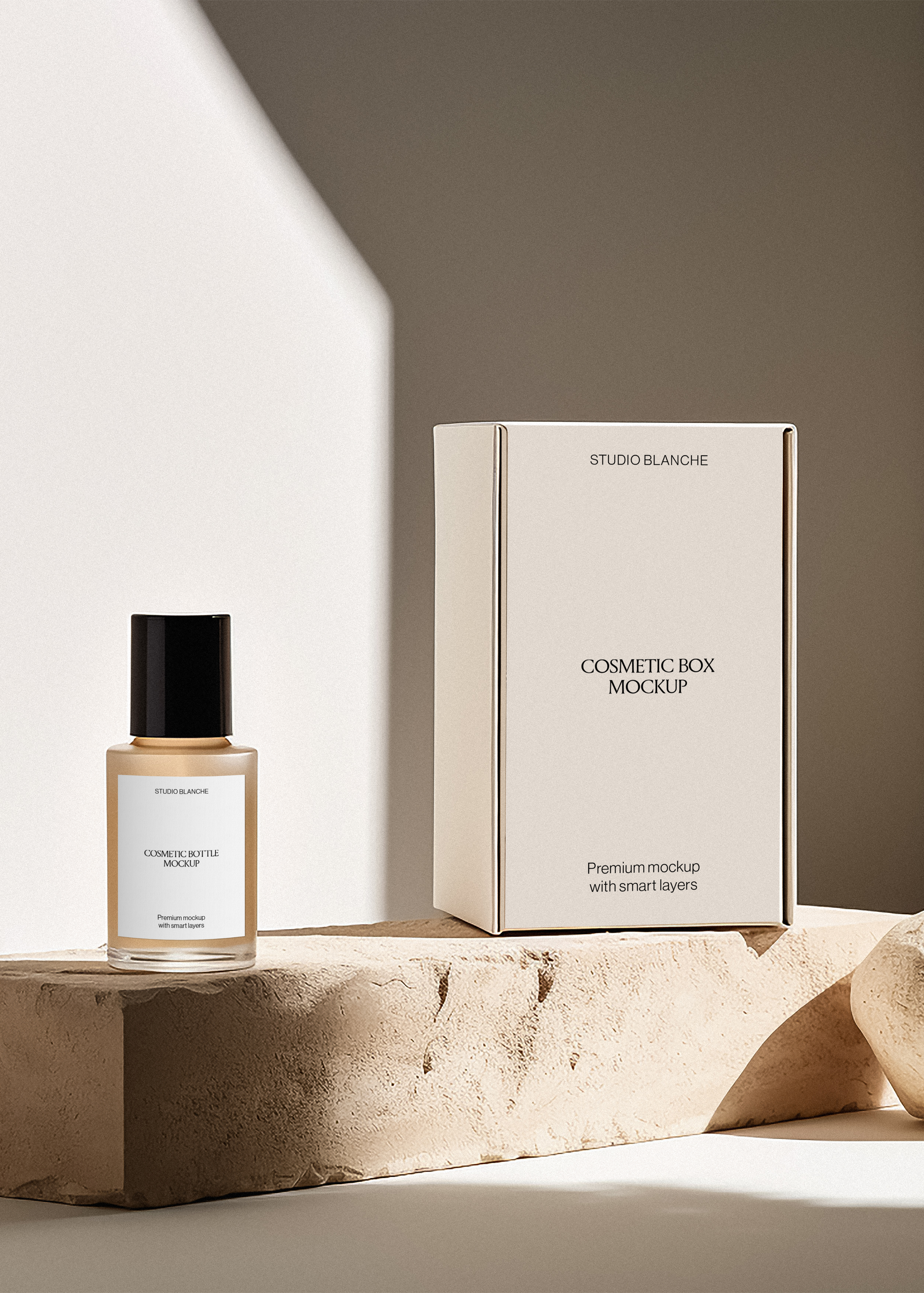 Frosted cosmetic bottle with amber liquid and black cap beside cream Blanche box on sandstone, soft daylight shadows