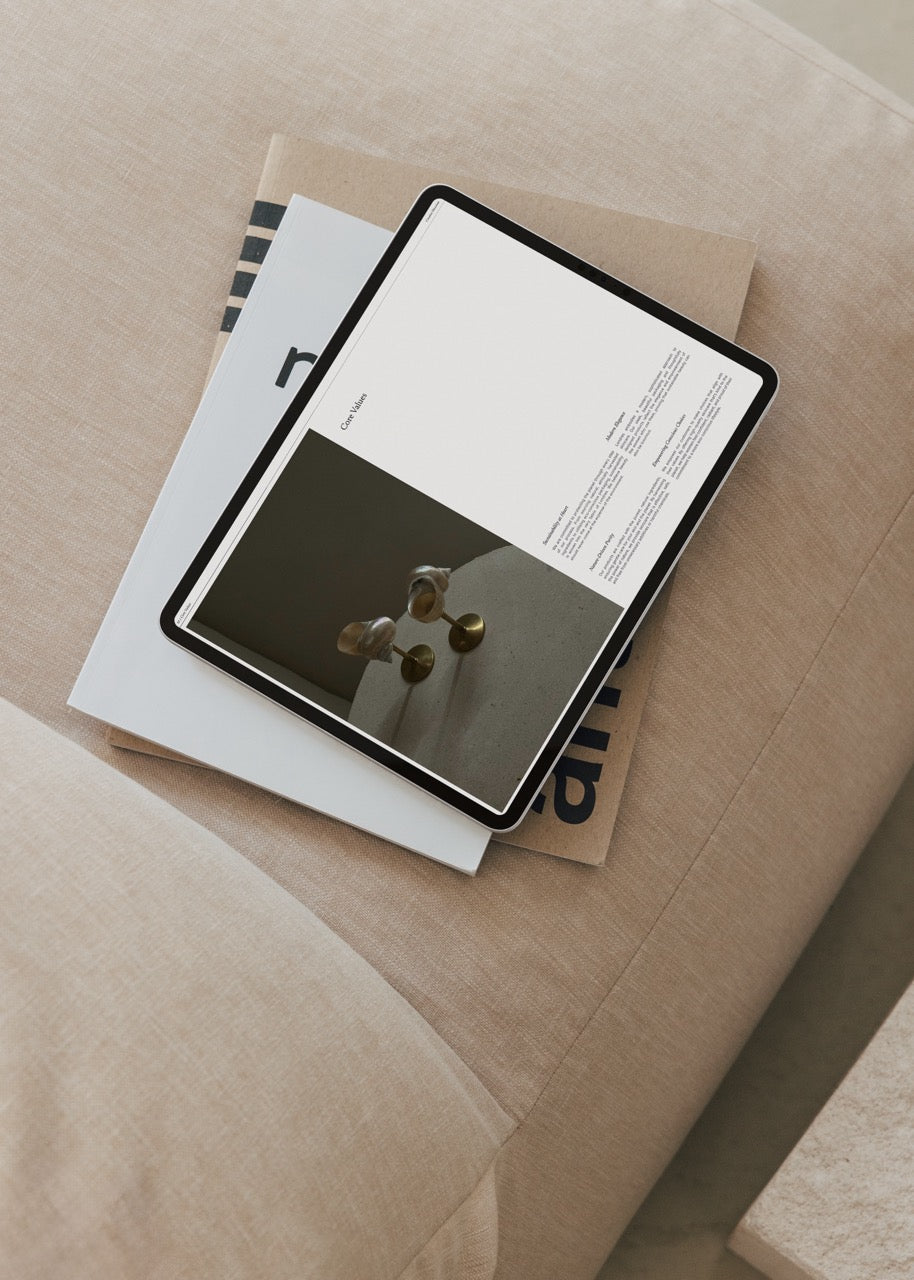 Tablet on top of a magazine with a minimalistic design