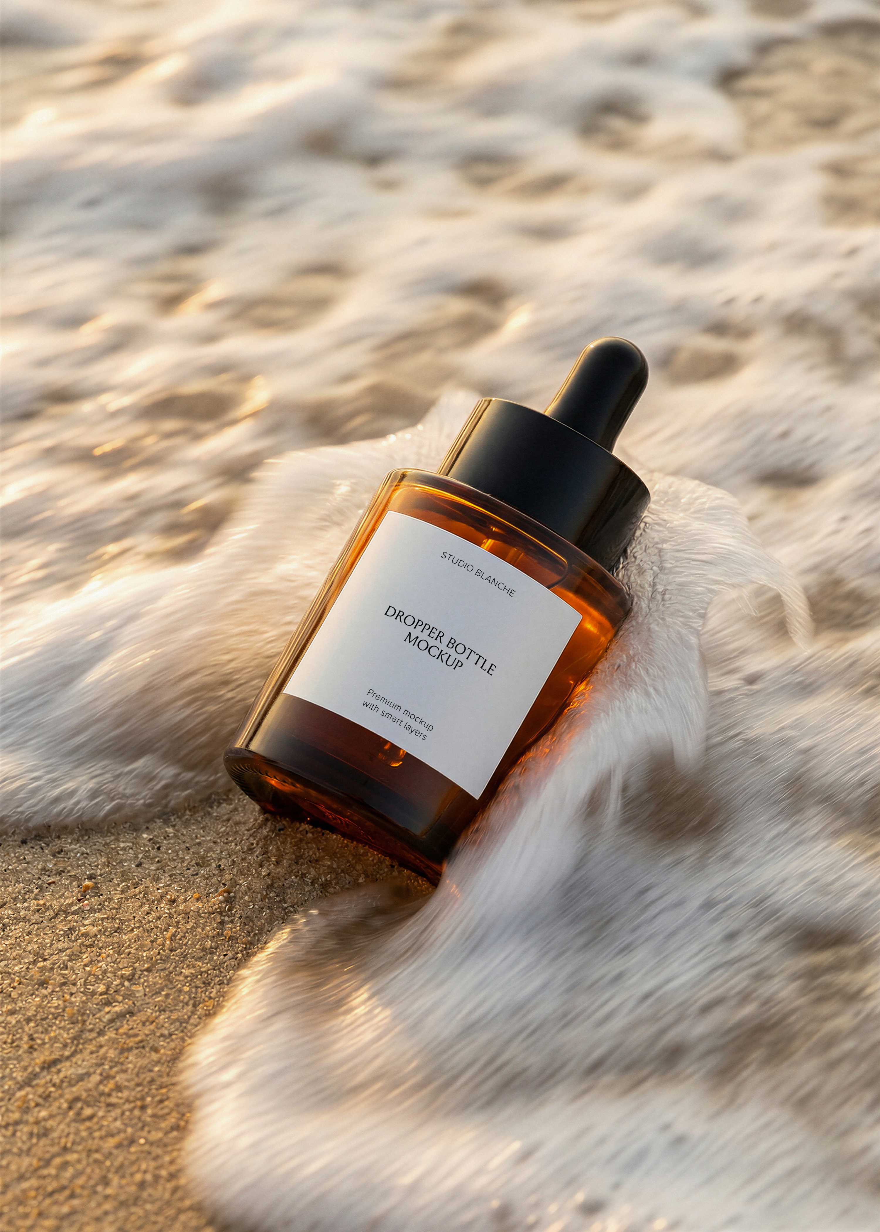 Amber glass serum dropper bottle mockup in coastal shoreline scene, white foam, backlit sunset, editorial styling