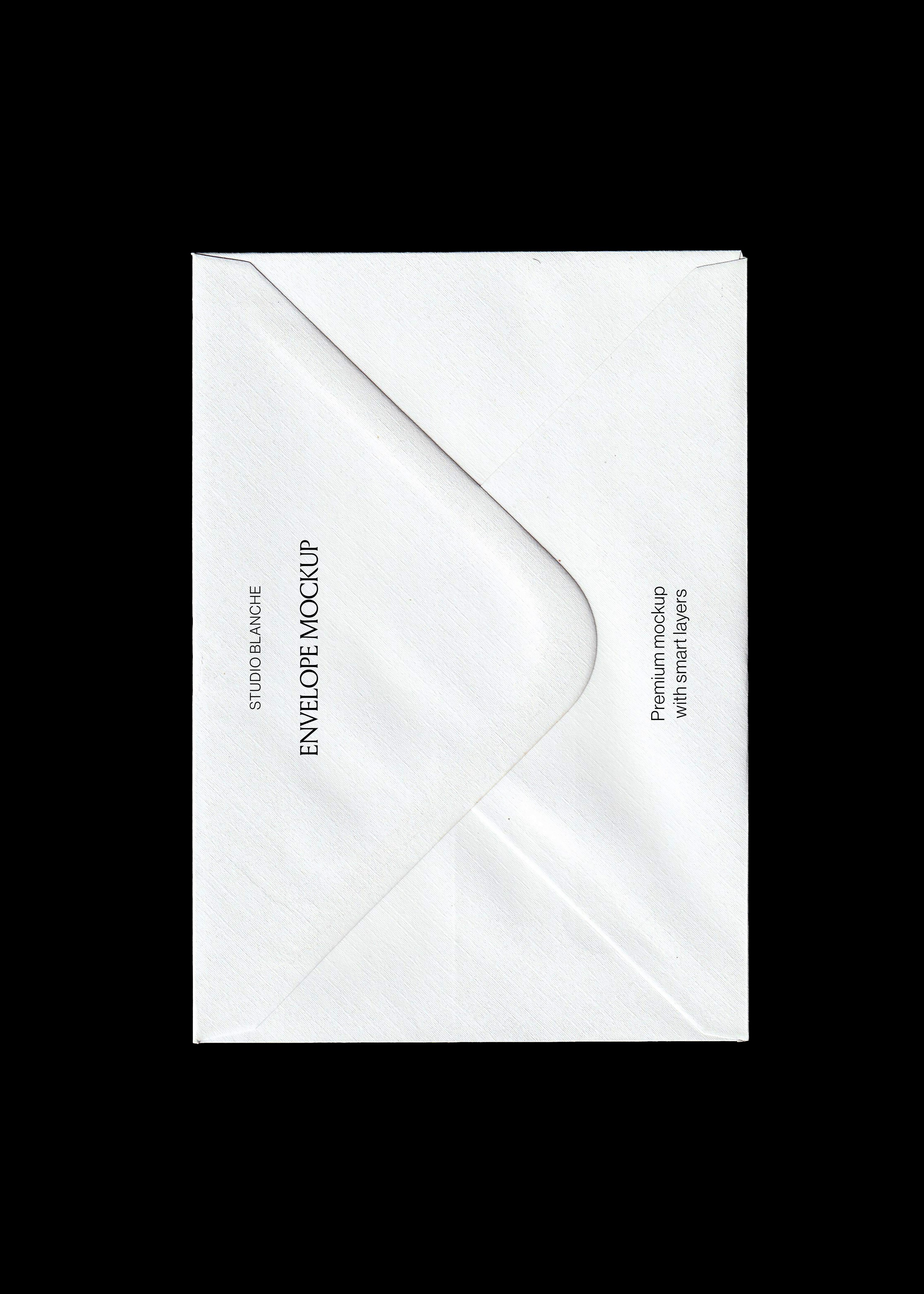 White envelope mockup on black background, textured paper with sealed triangular flap and vertical black type
