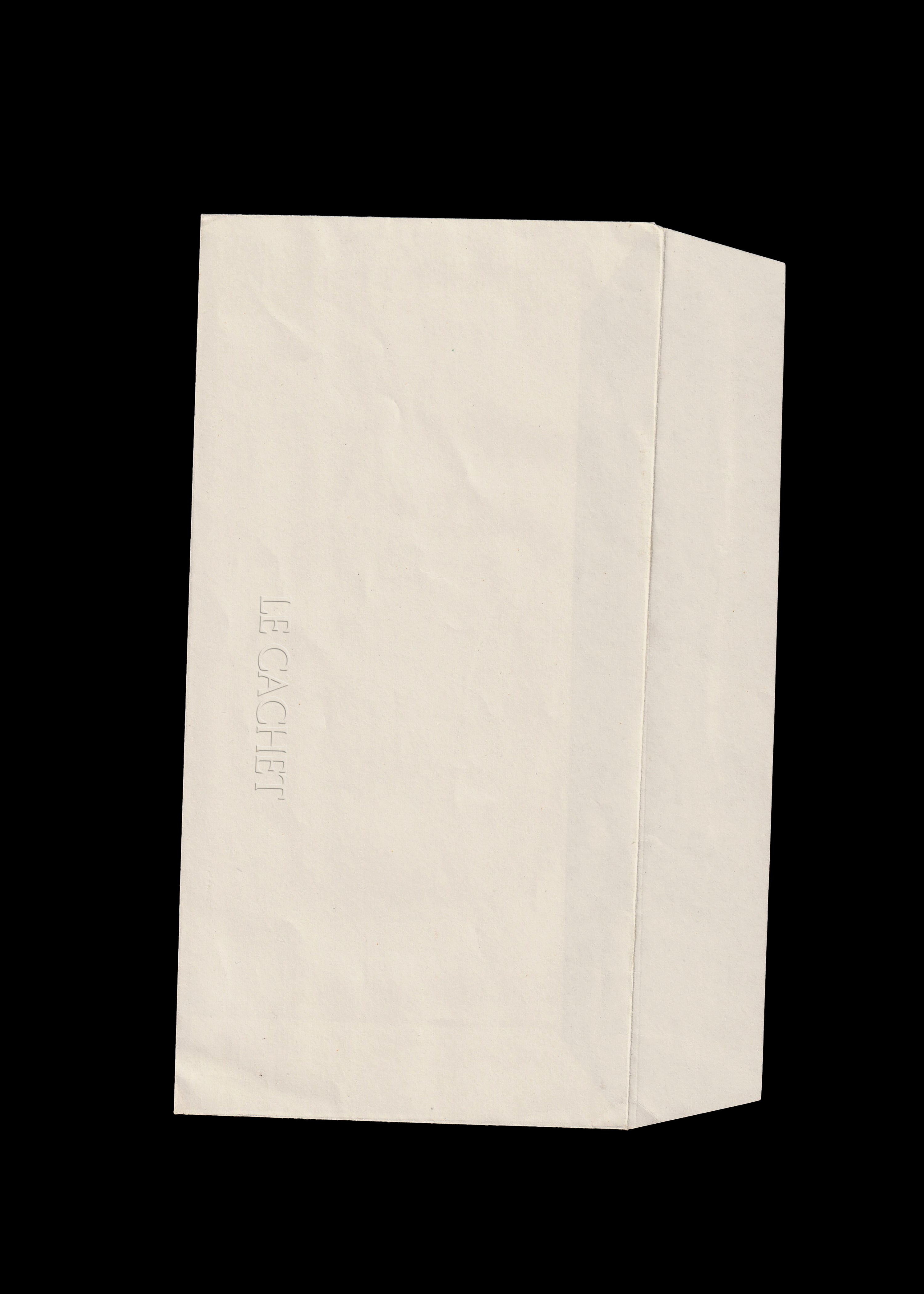 Cream gusset envelope mockup scanned on black, crumpled paper with blind embossed vertical wordmark