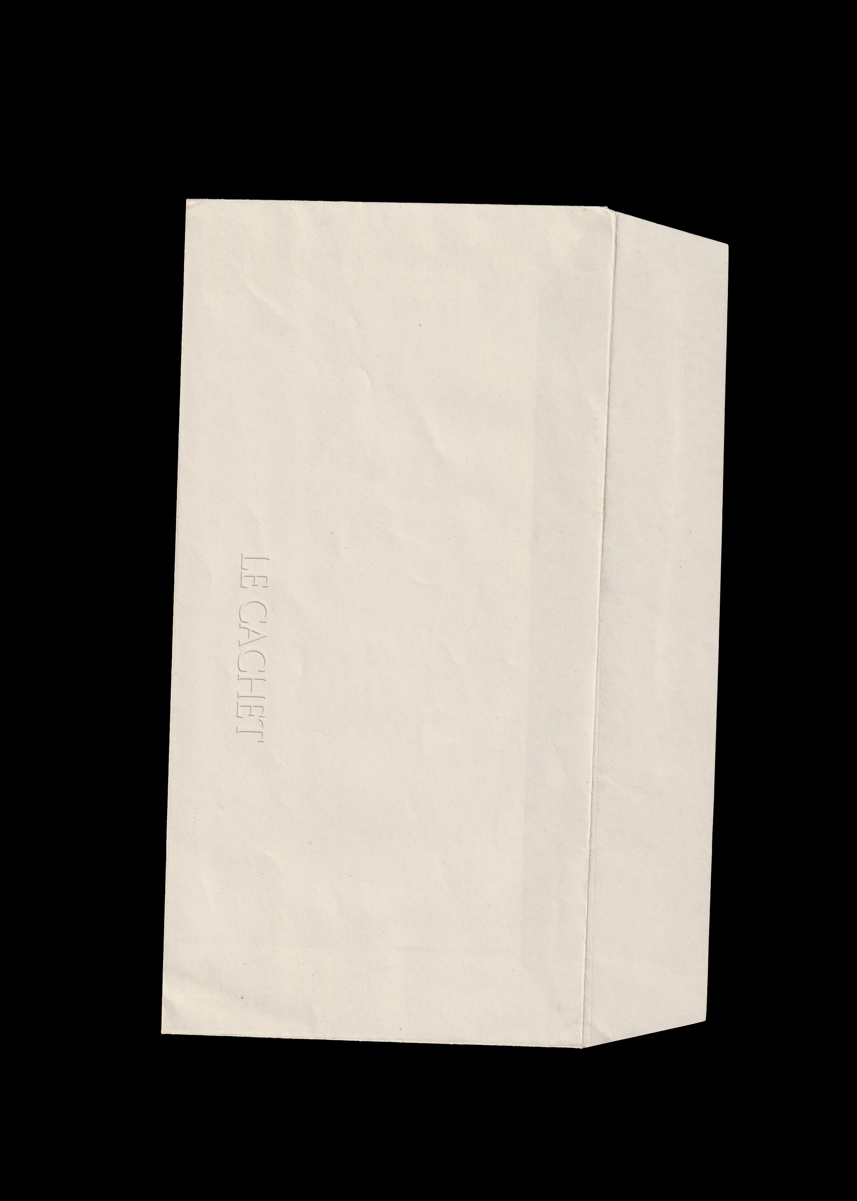 Cream gusset envelope mockup scanned on black, crumpled paper with blind embossed vertical wordmark