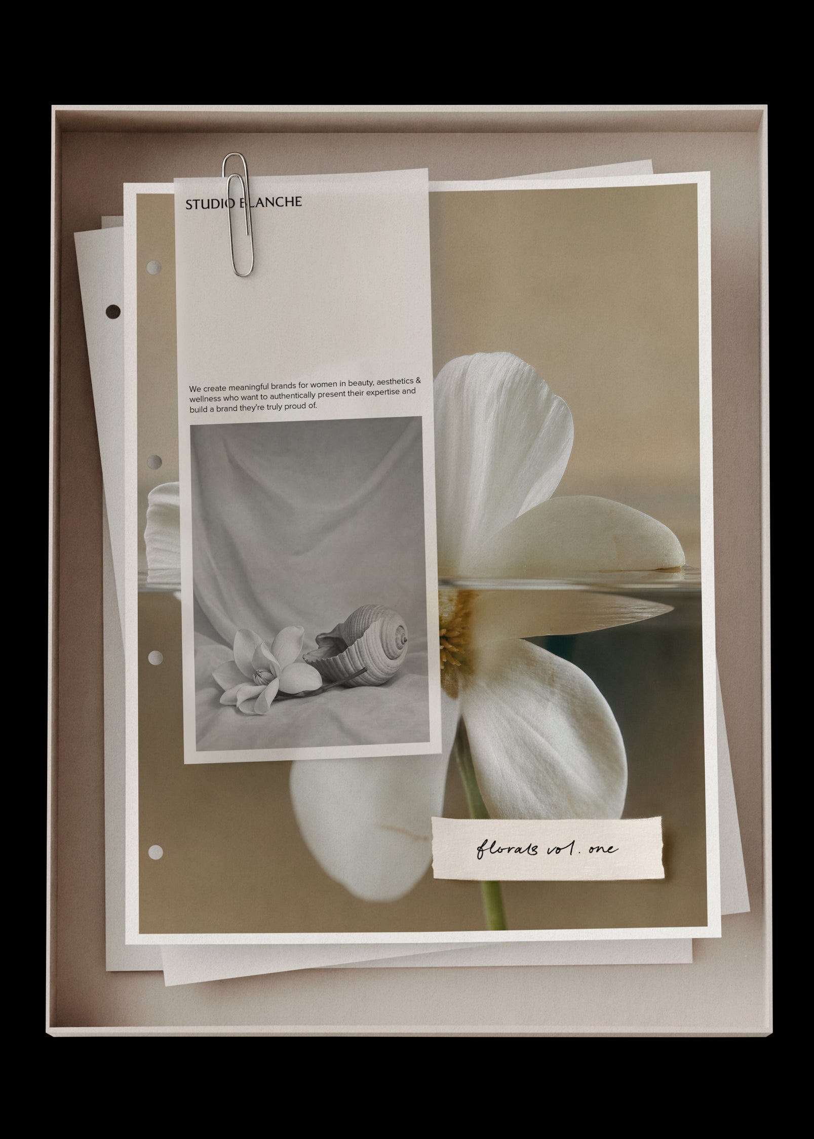 Layered print mockup showing Floral Vol. I floral stock images in a sand-toned box with paper and paperclip styling