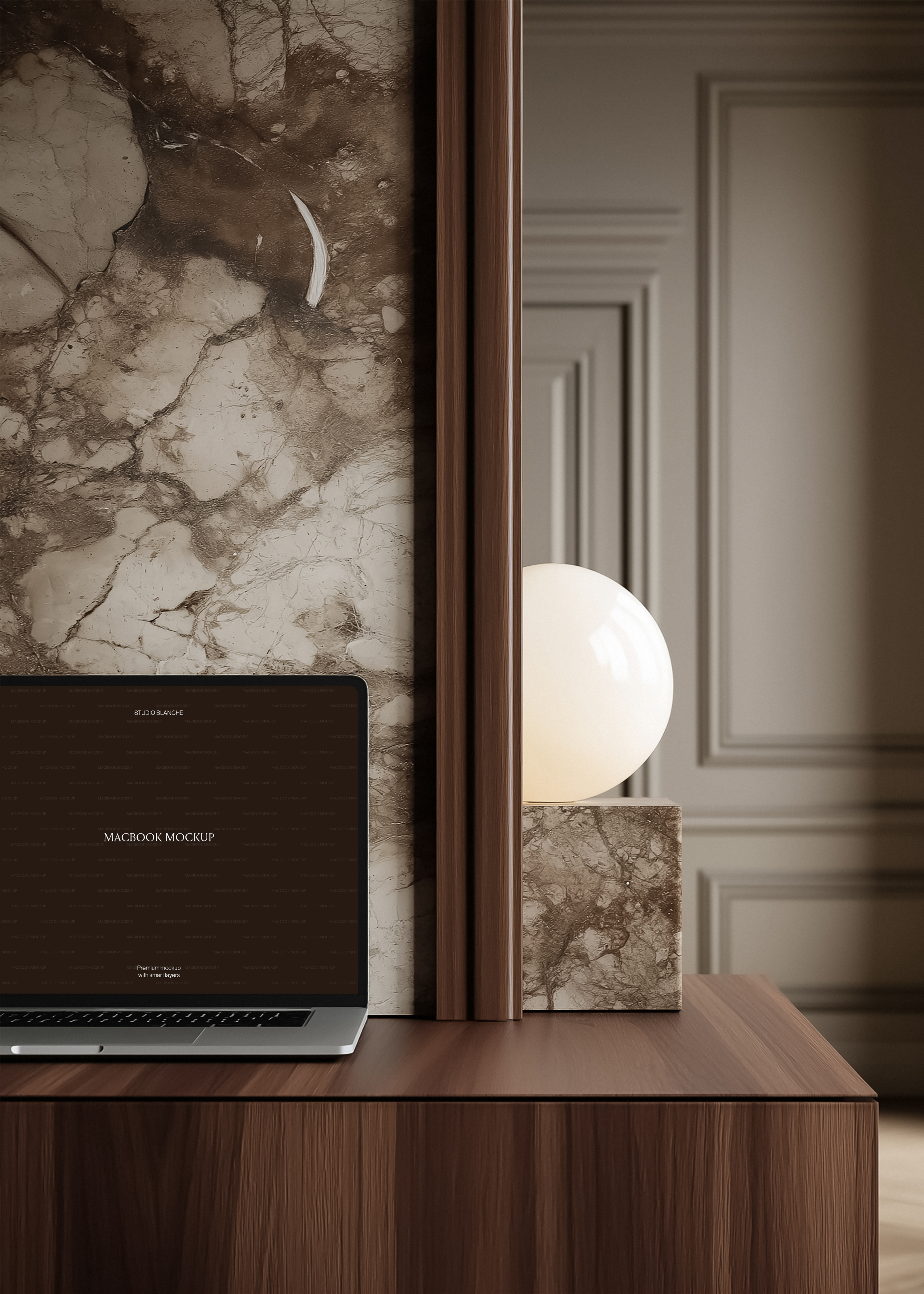 MacBook mockup on dark walnut desk, globe lamp on stone block, marble artwork panel and moulded wall panelling