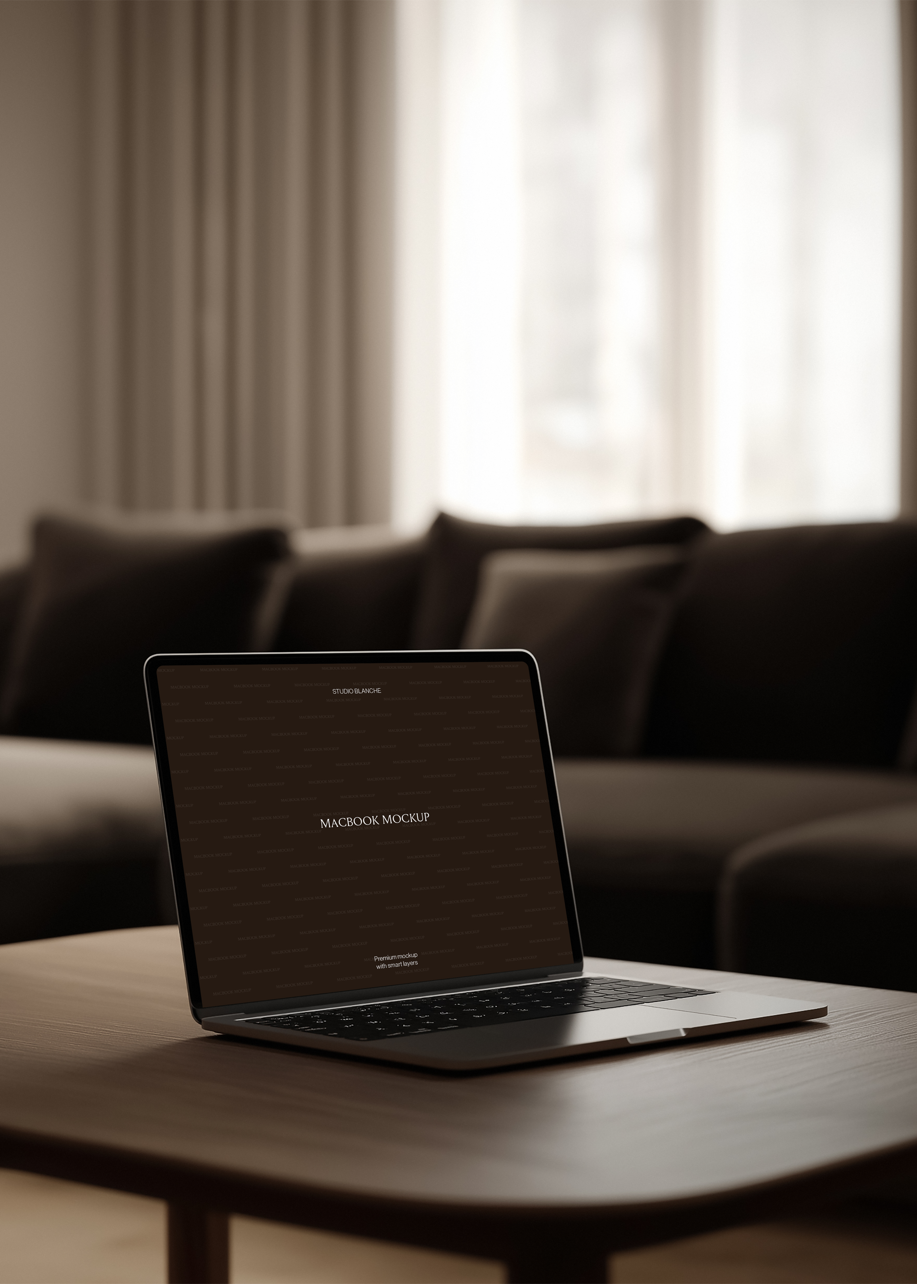 MacBook mockup open on dark oak coffee table, deep charcoal sofa and soft window light through floor-length curtains 