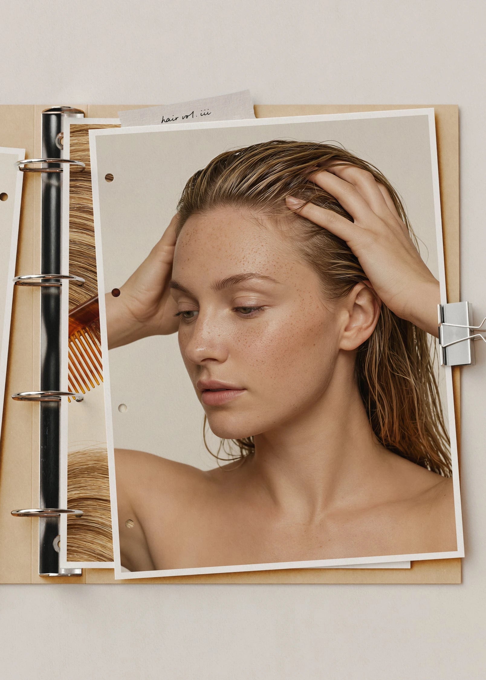 Hair Vol. III mockup, ring binder with wet-hair editorial portrait and warm sand tones, Studio Blanche stock photography.
