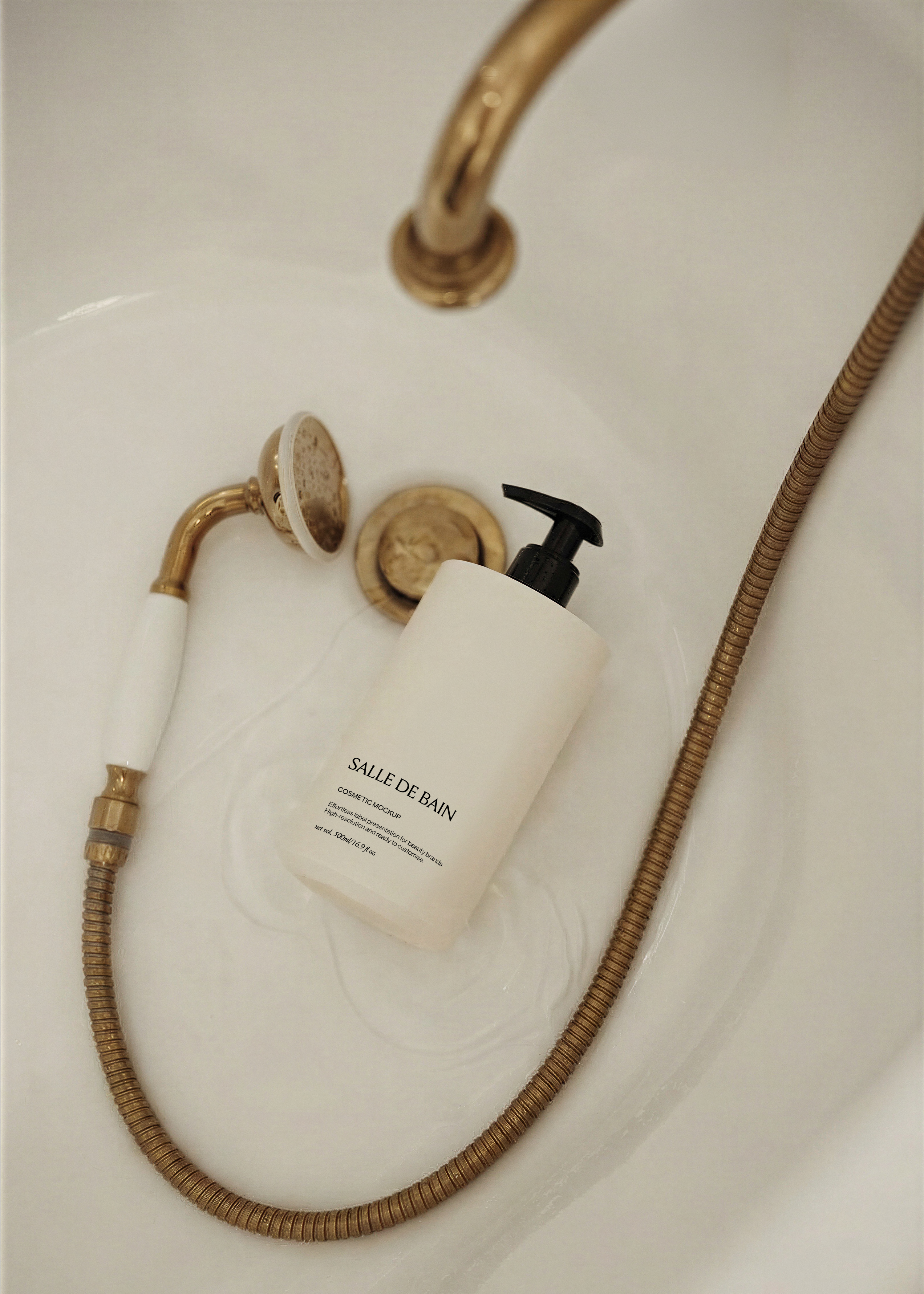 White plastic pump bottle mockup with black pump resting in a white bathtub beside vintage gold tap and shower hose