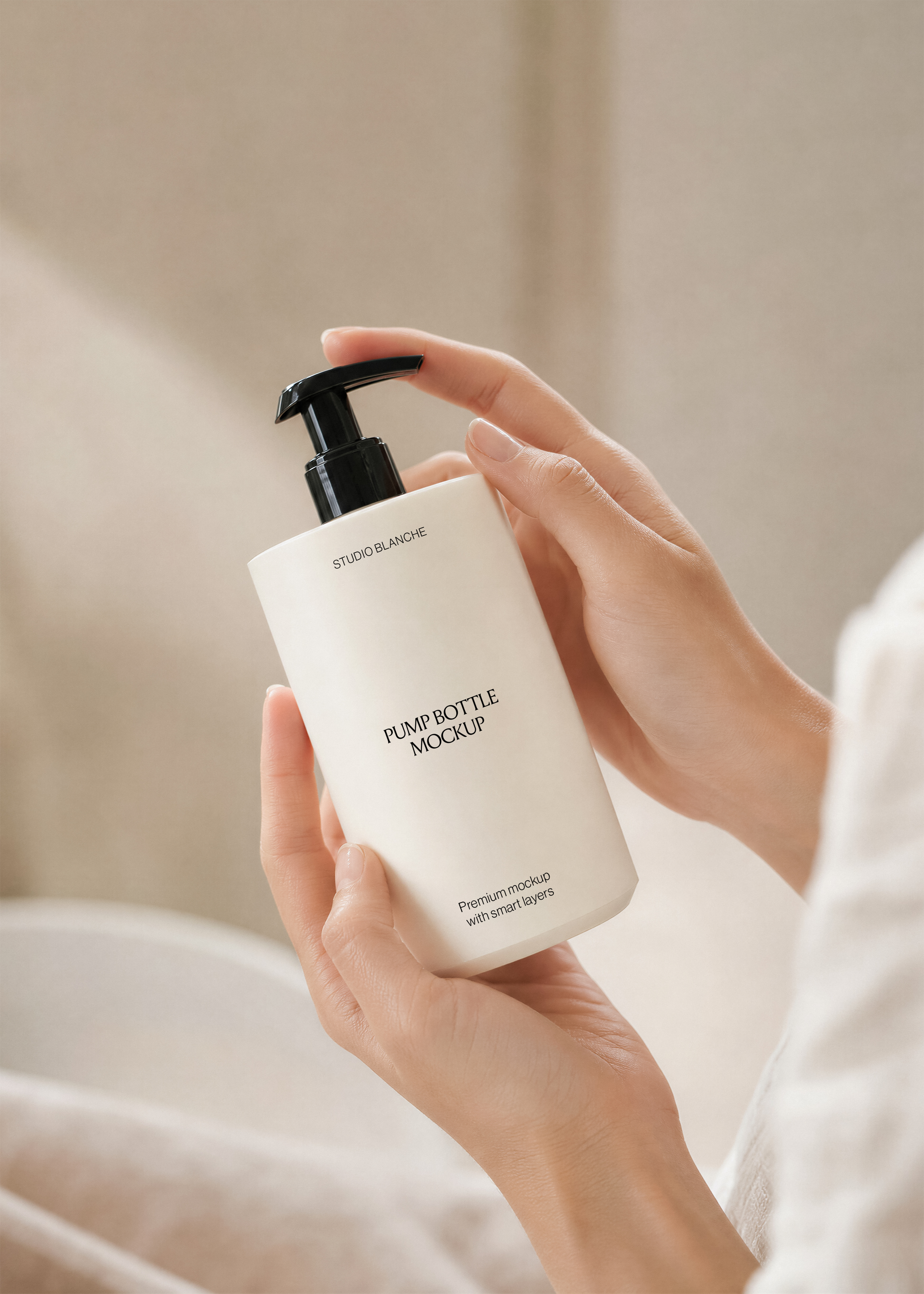 Close view of white pump bottle mockup with minimal black label typography, cradled in hands, soft neutral lighting