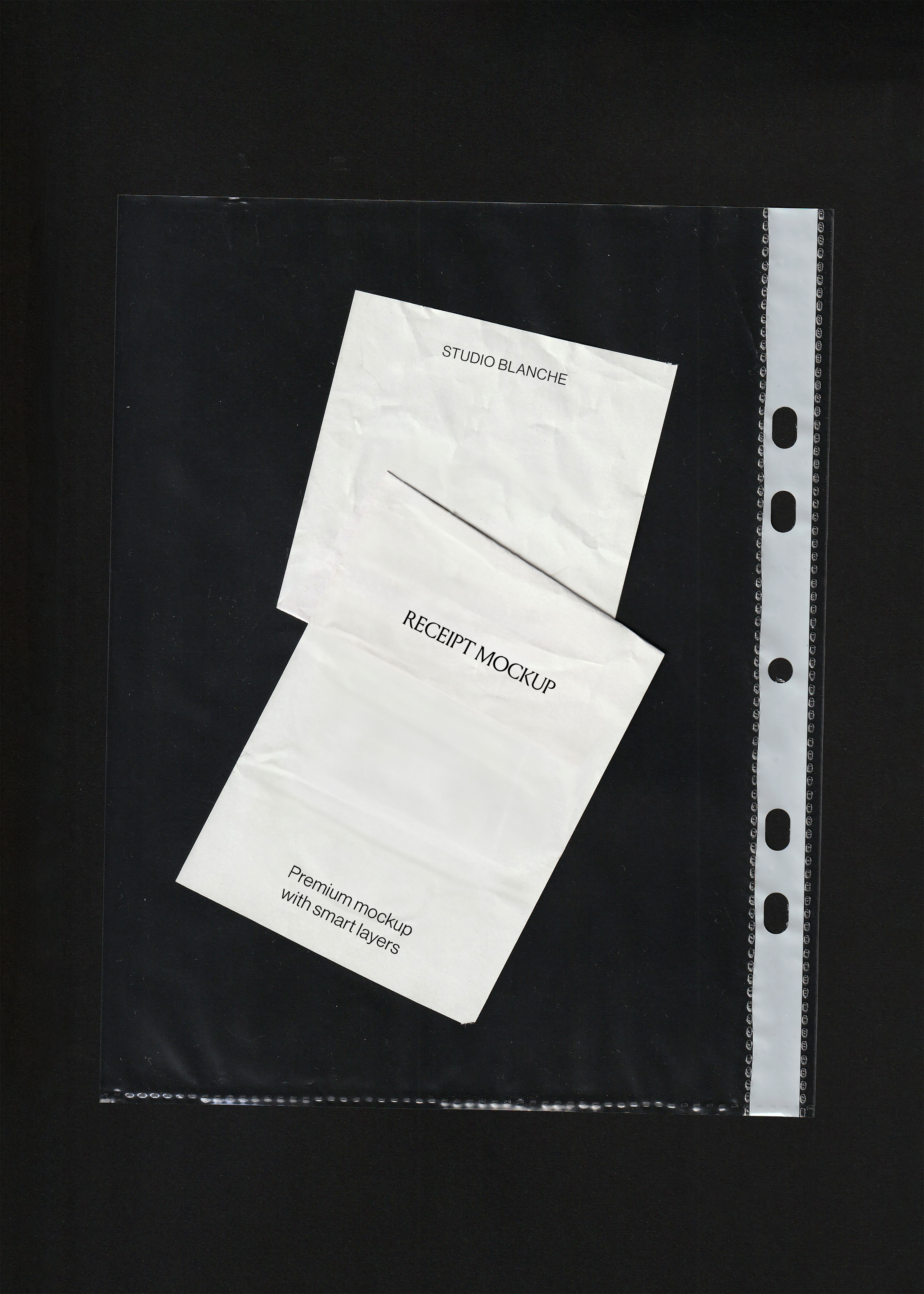 Blank receipt mockup torn in two inside a plastic filing sleeve on black, creased paper and punched holes