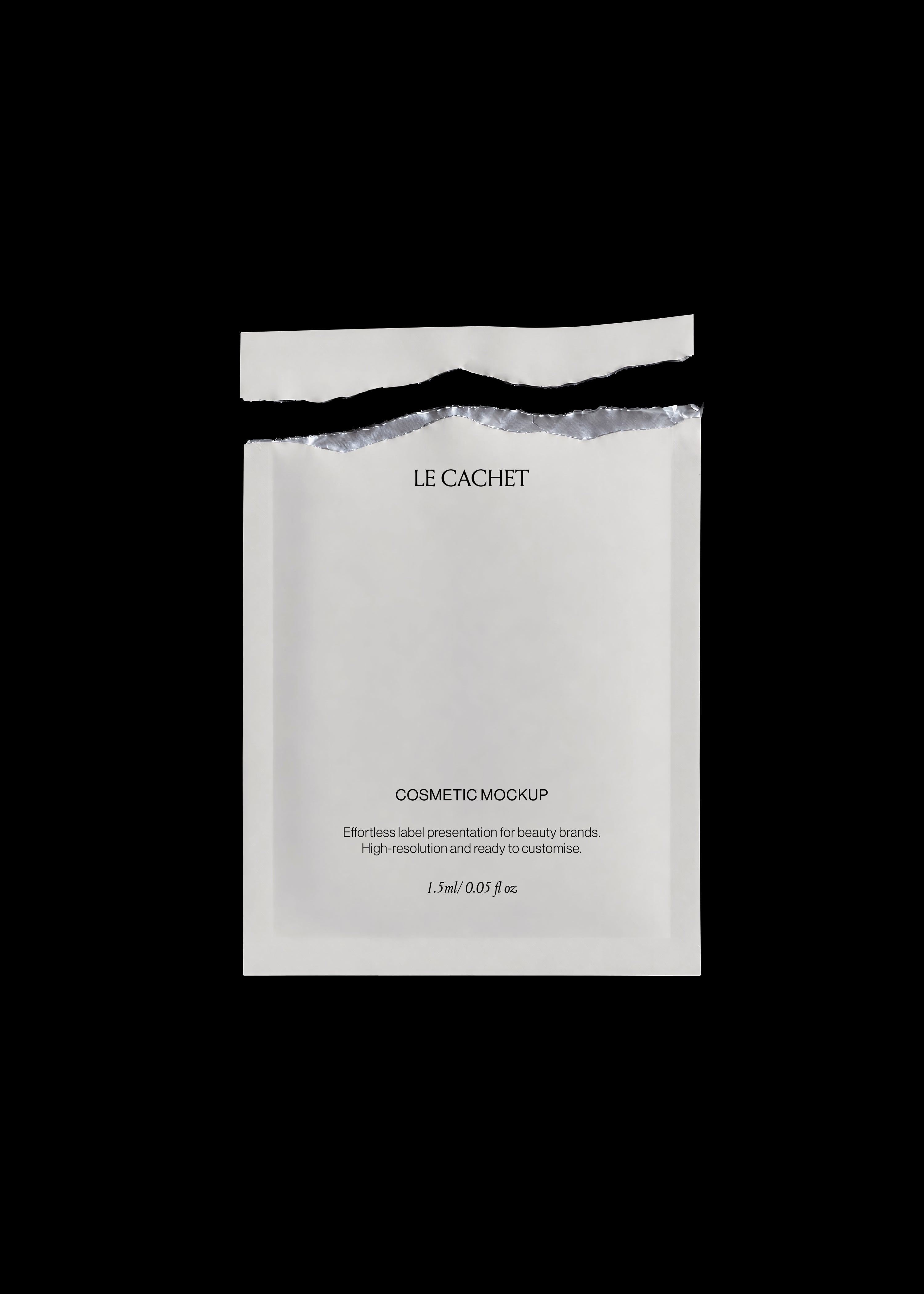 White cosmetic sachet mockup torn open at the top, revealing silver foil lining, minimal editorial flat lay on black