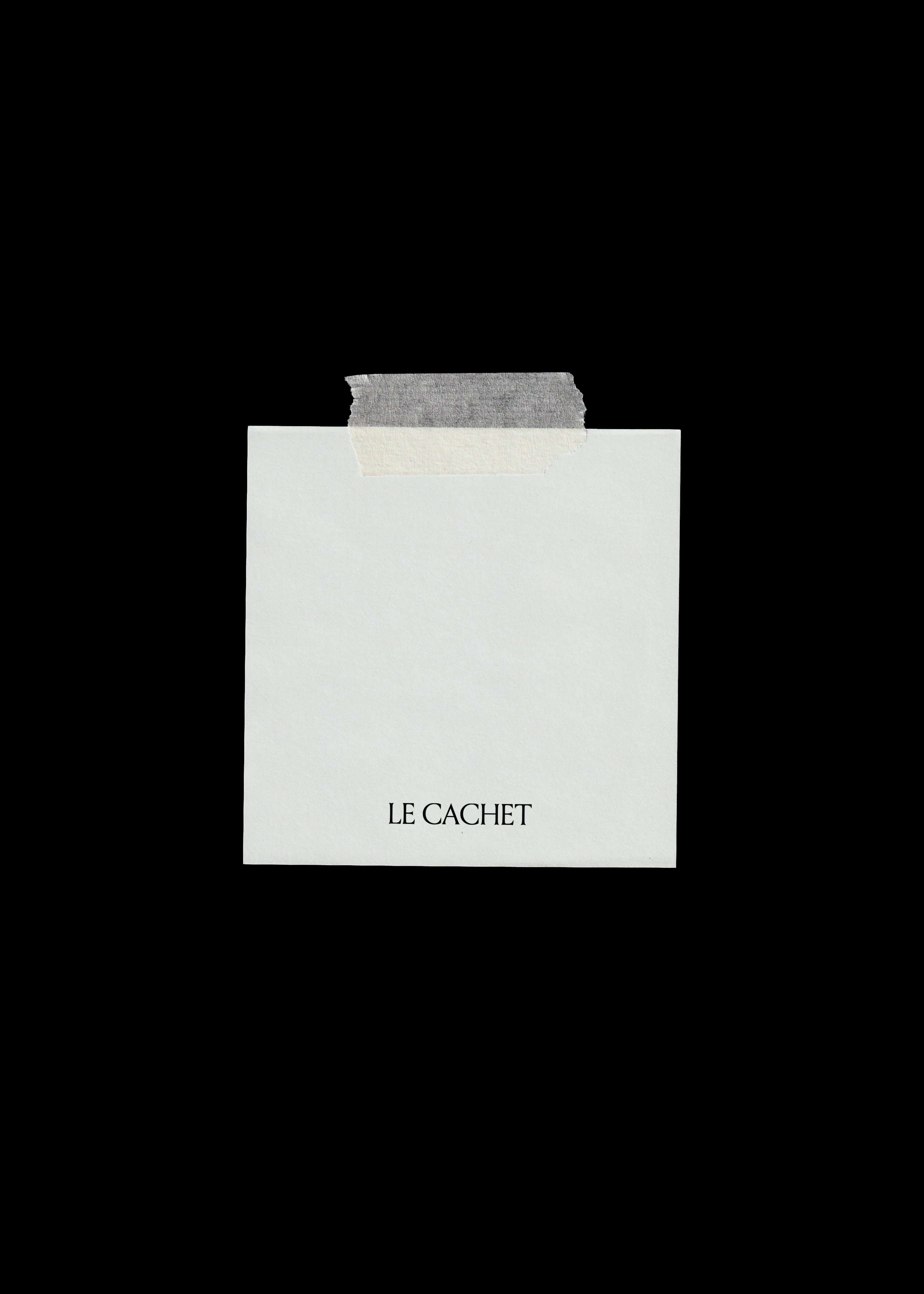 Scanned note and tape mockup, square off-white note held by a grey torn tape strip on a black background