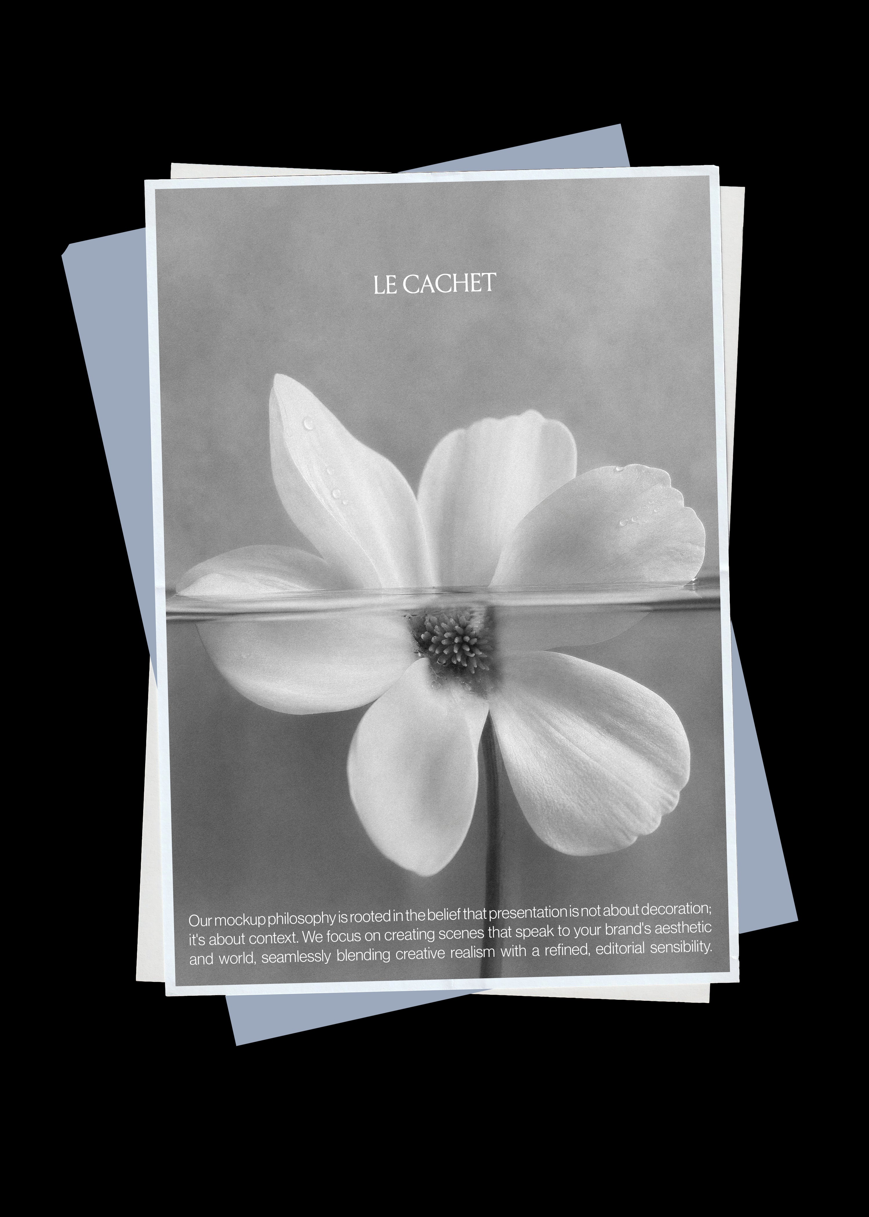 Stacked paper mockup on black, greyscale flower print sheet over white and blue grey pages beneath