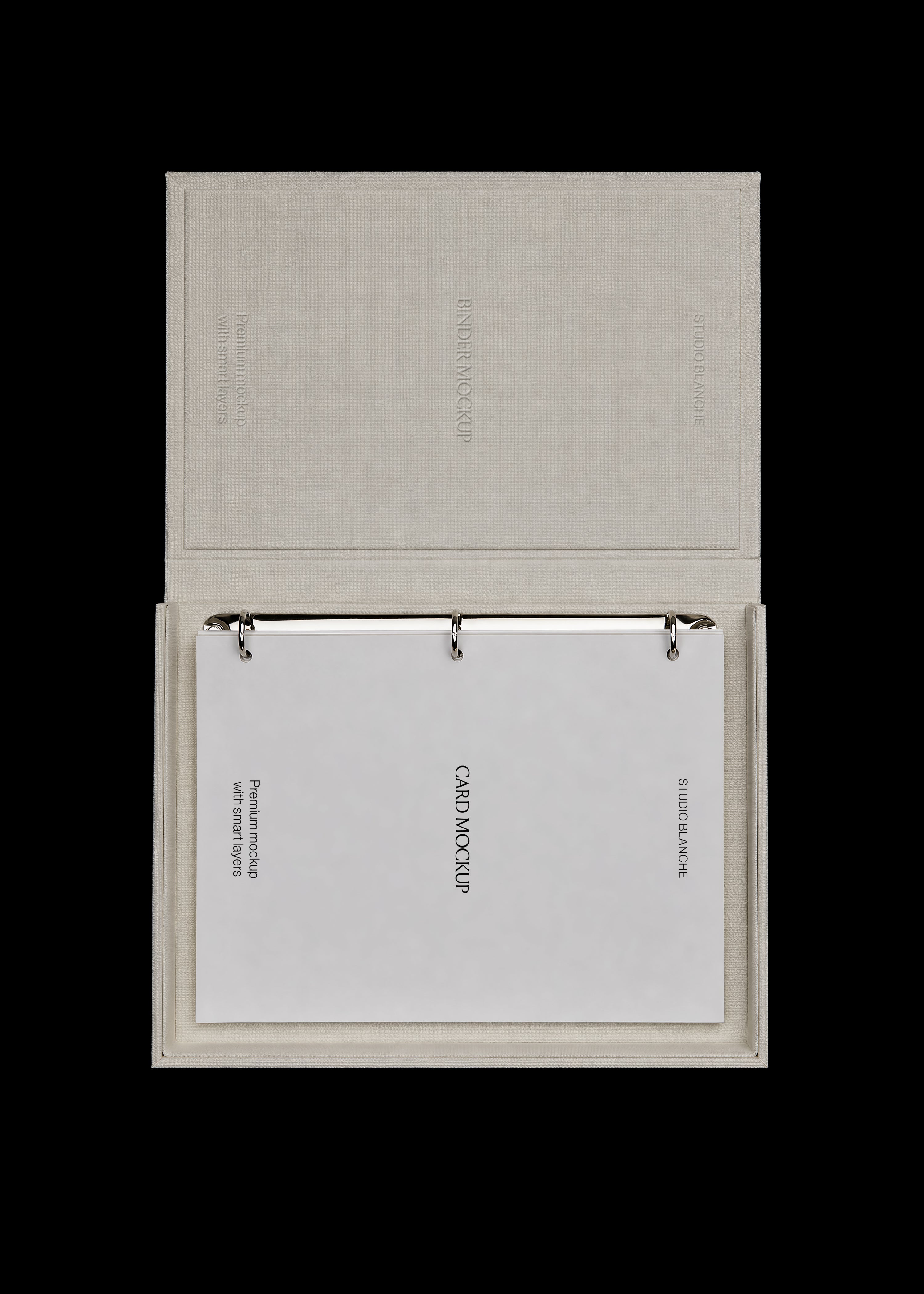 Binder and card mockup, linen box open with embossed lid panel, chrome rings and light grey card, top-down view