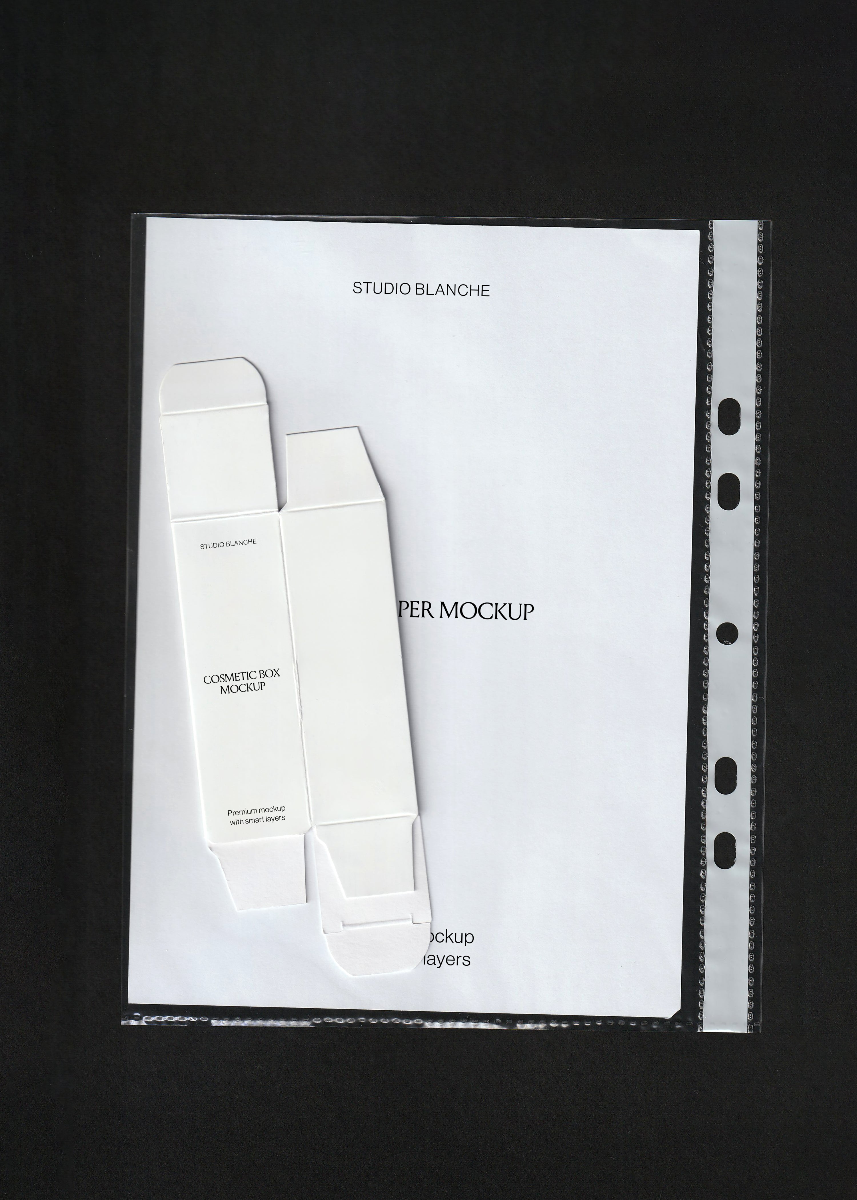 Blank white cosmetic box mockup on a white paper sheet in a clear punched pocket, black background