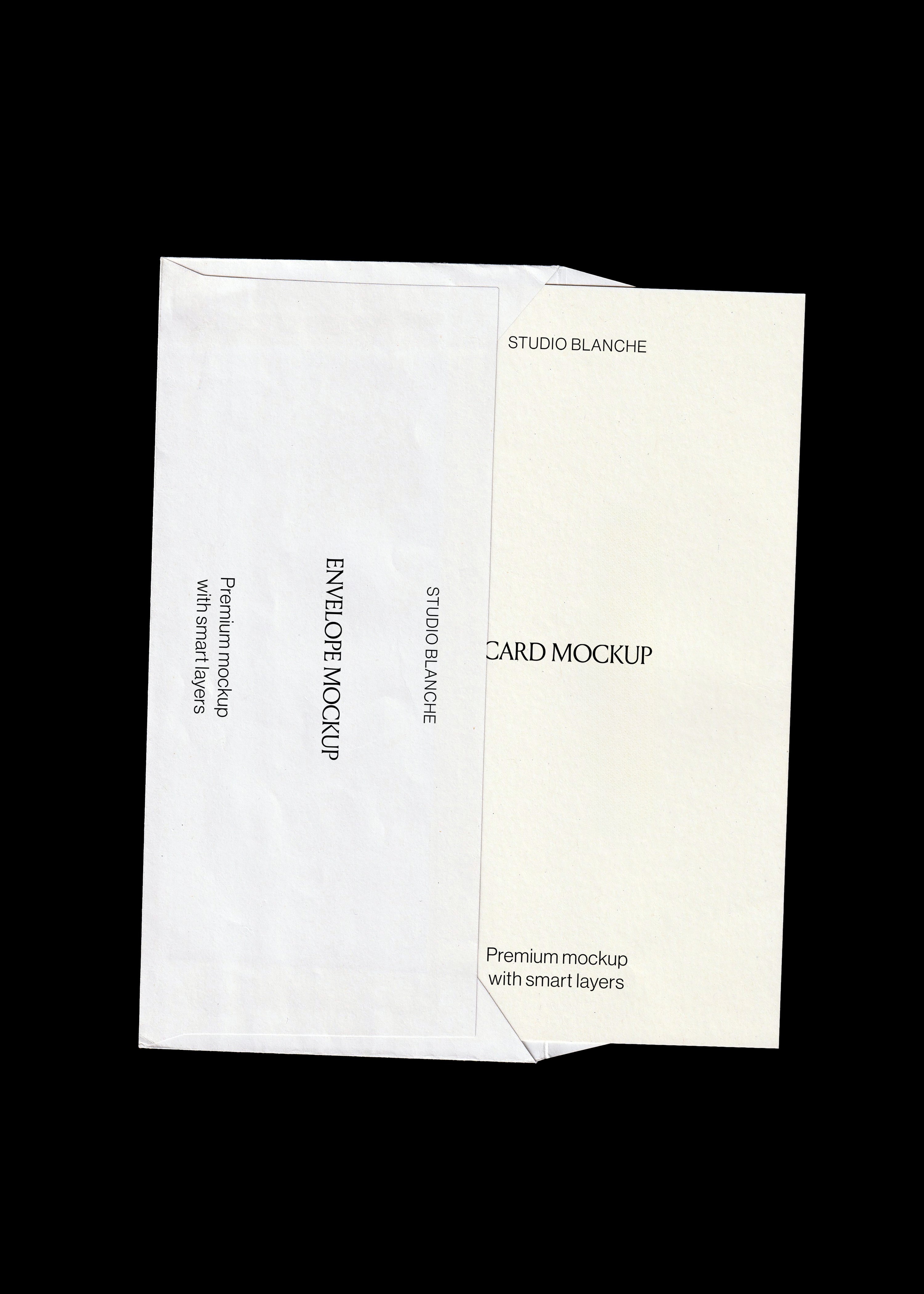 Scanned stationery mockup, textured white envelope layered over a cream card with vertical type, black background