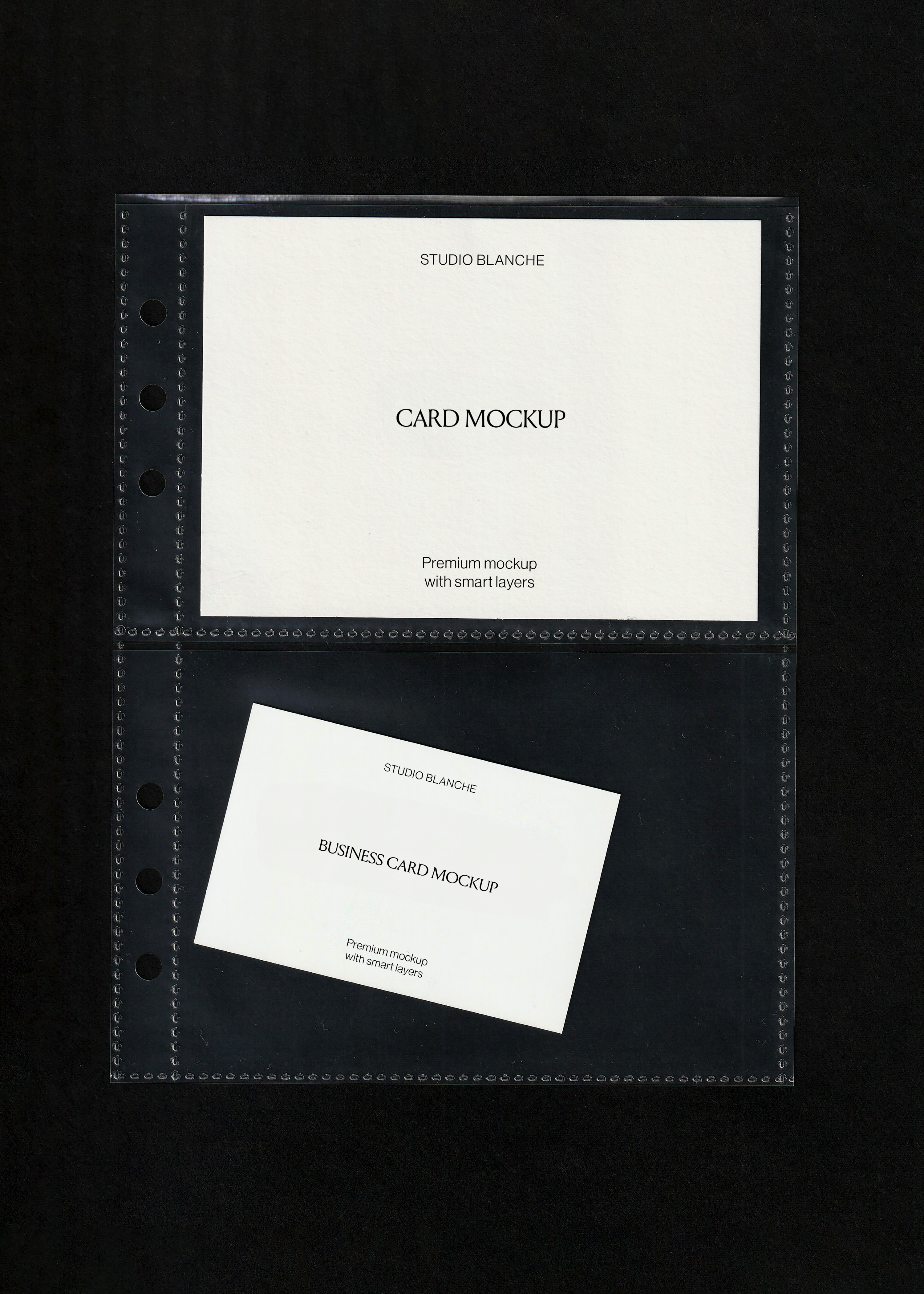Business card mockup angled inside the lower sleeve of a punched pocket below a blank white card, black backdrop