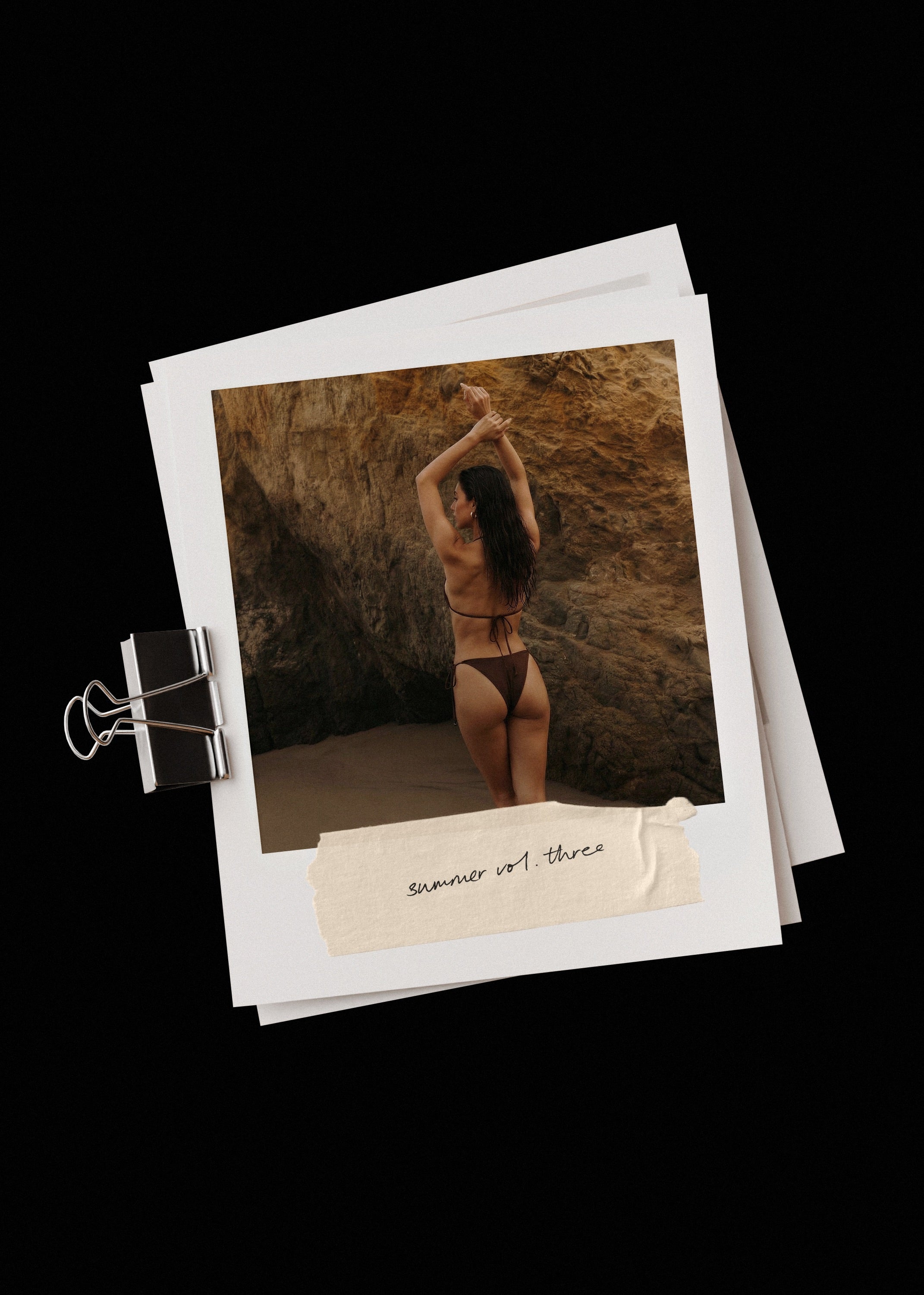 Summer Vol. III mockup, dark-haired model in brown bikini, arms raised, rocky cliff, warm earthy tones, Studio Blanche.
