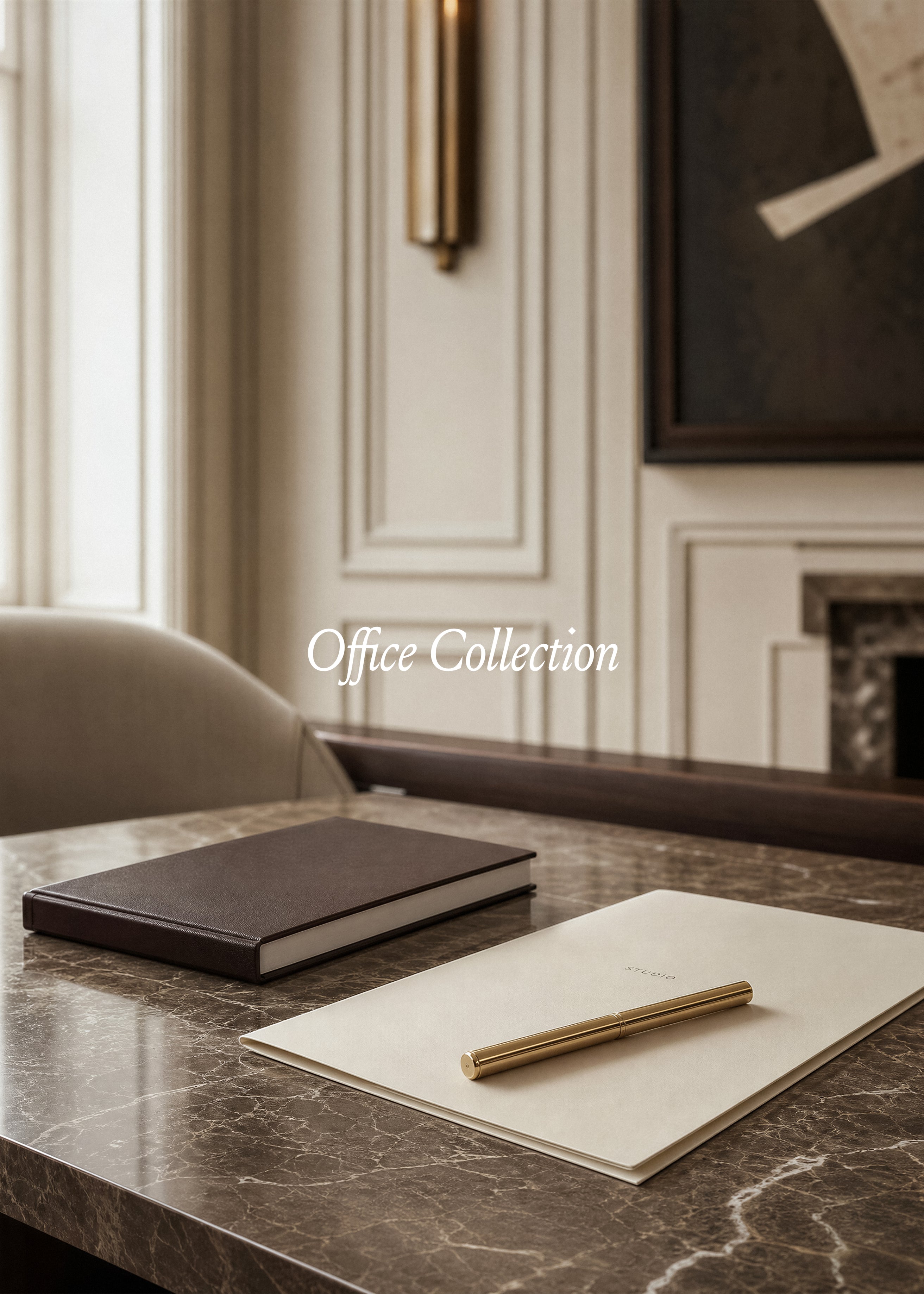 Dark leather notebook and gold pen on cream paper atop taupe marble desk, warm plaster office interior, Office Collection stock
