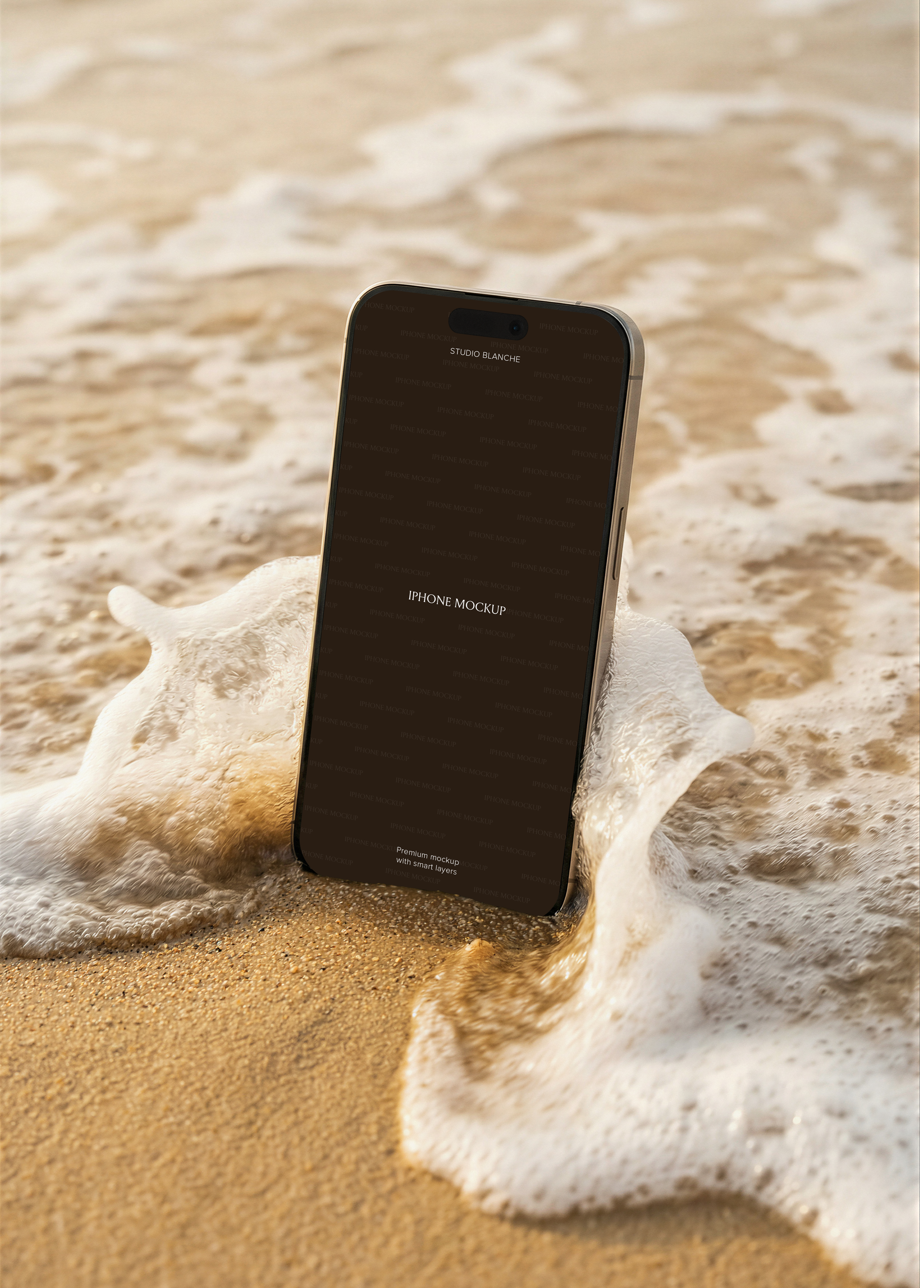iPhone standing upright in shallow beach wave on golden sand, warm afternoon light, coastal lifestyle mockup